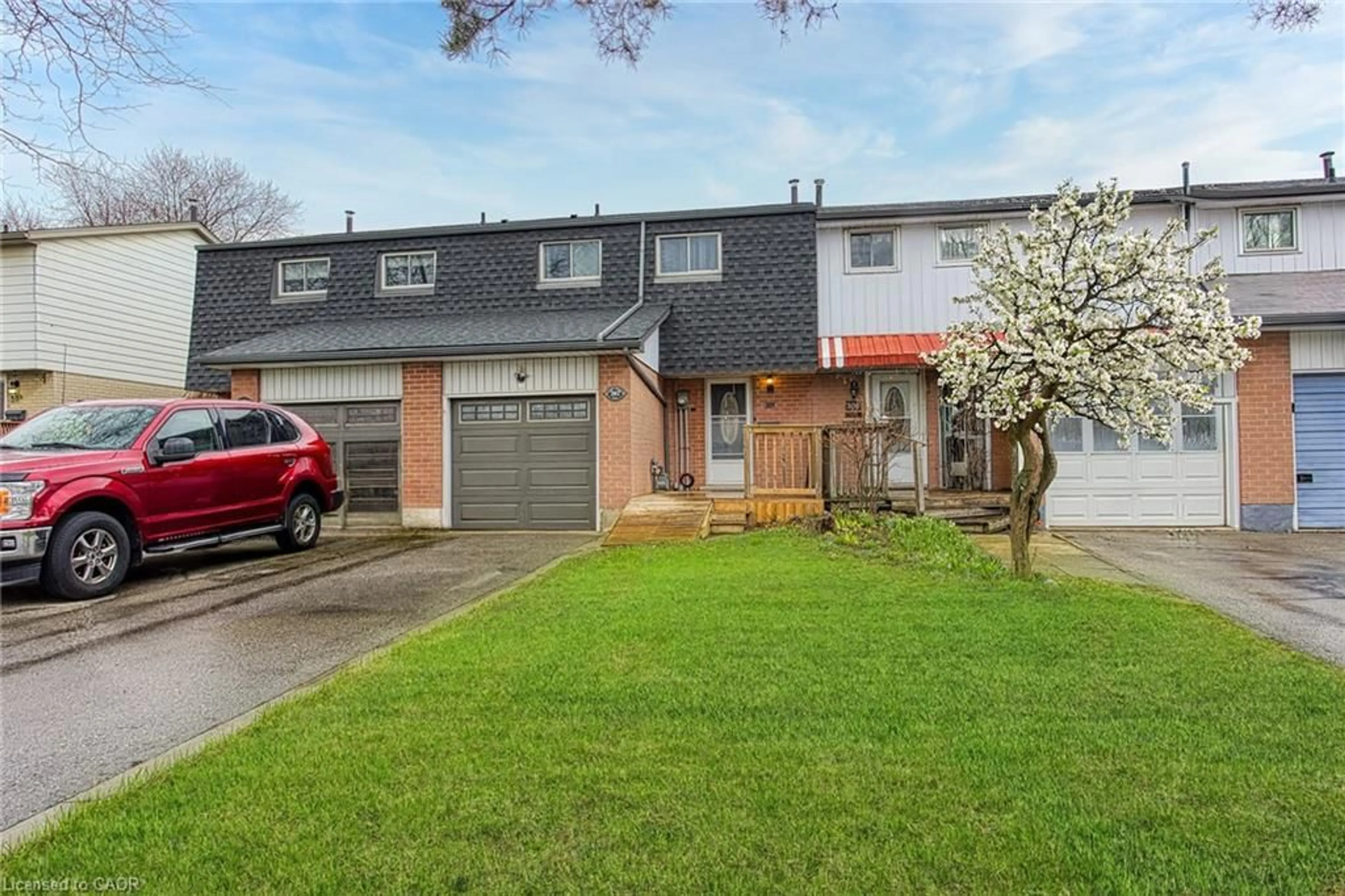 Home with brick exterior material, street for 202 Golden Orchard Dr, Hamilton Ontario L9C 6J7