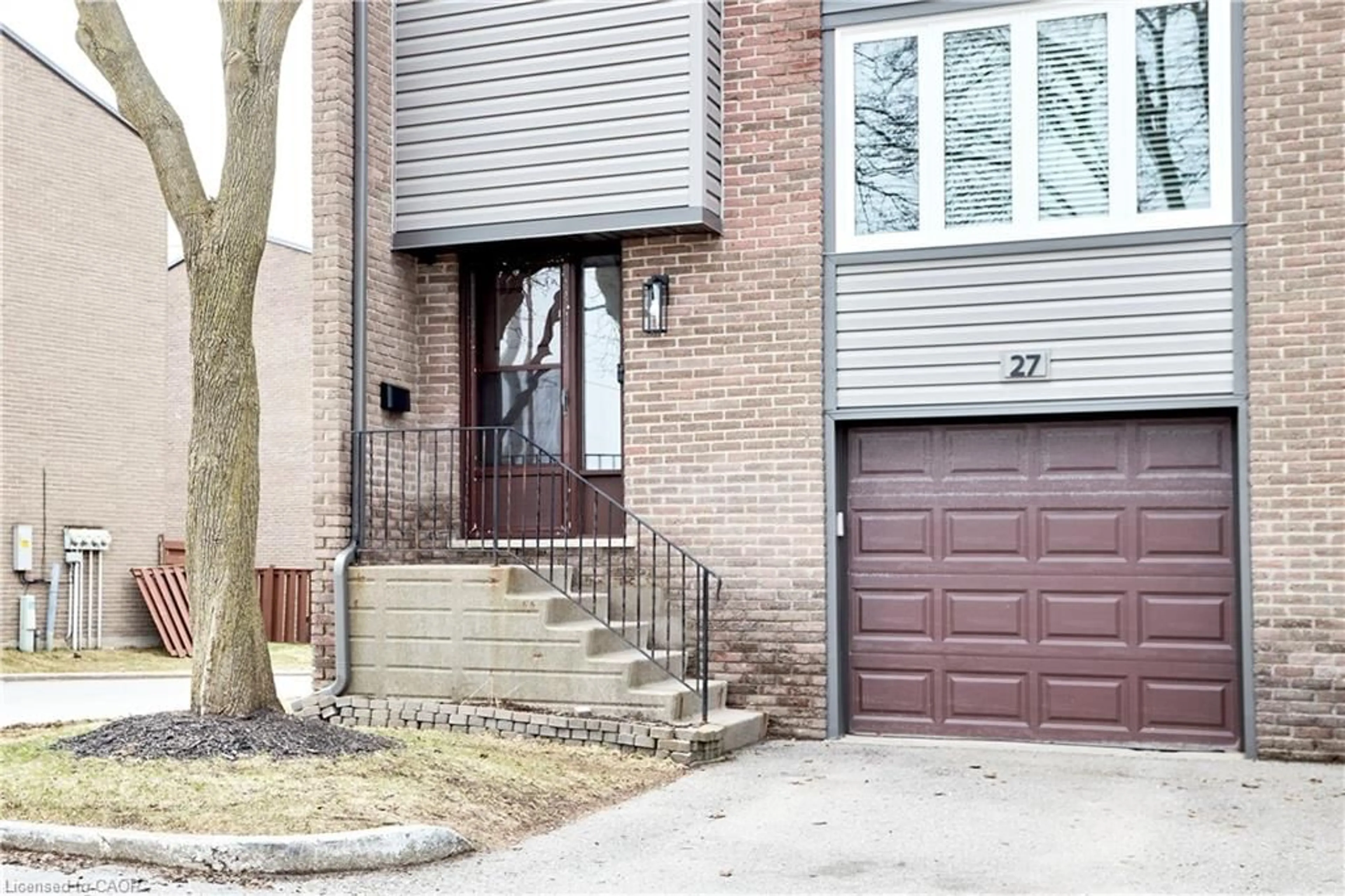 Home with brick exterior material, street for 46 Cedarwoods Cres #27, Kitchener Ontario N2C 2L7
