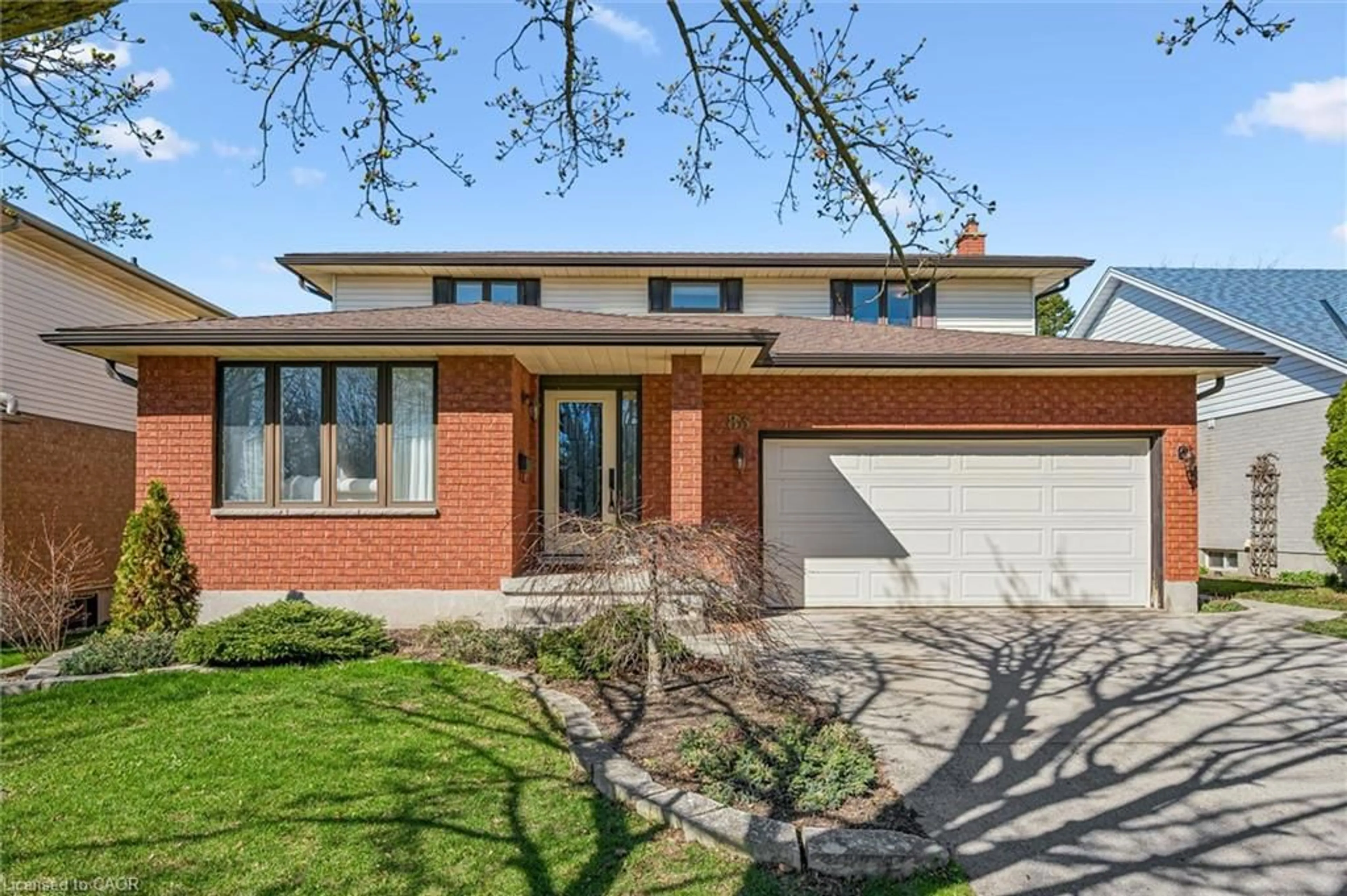 Home with brick exterior material, street for 83 Pinnacle Cres, Guelph Ontario N1K 1P5