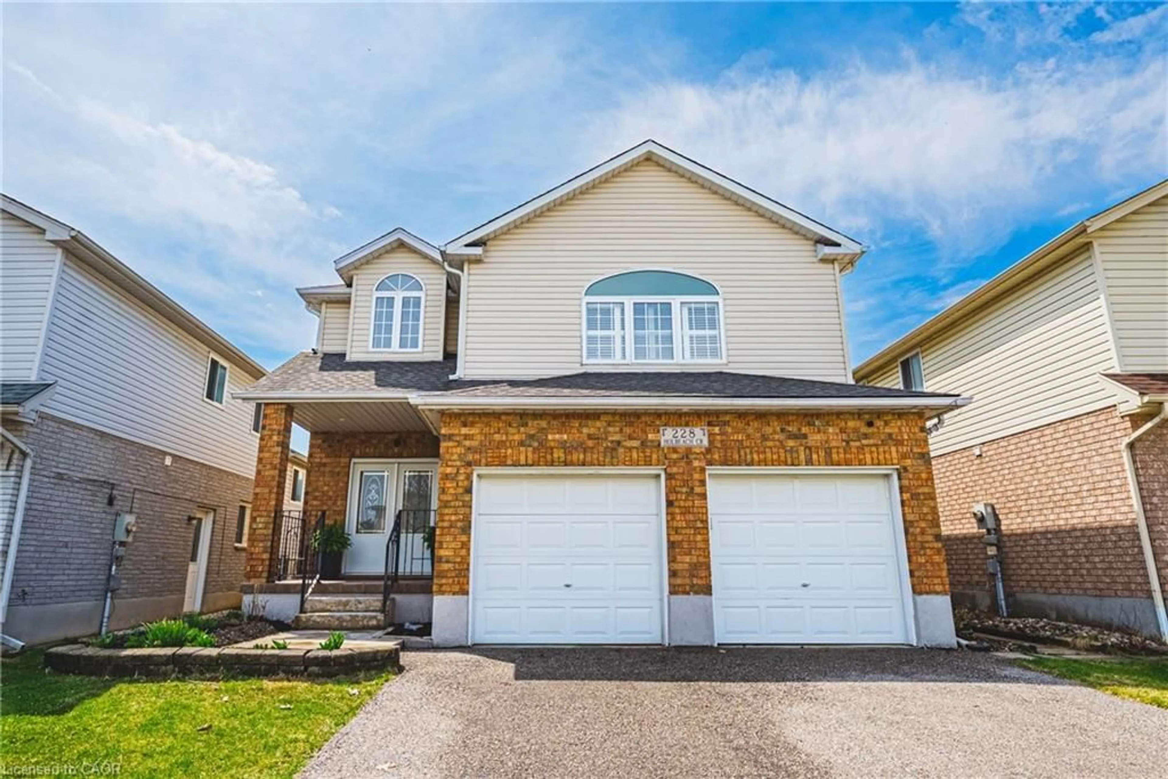 Home with brick exterior material, street for 228 Holbeach Cres, Waterloo Ontario N2J 4Y7