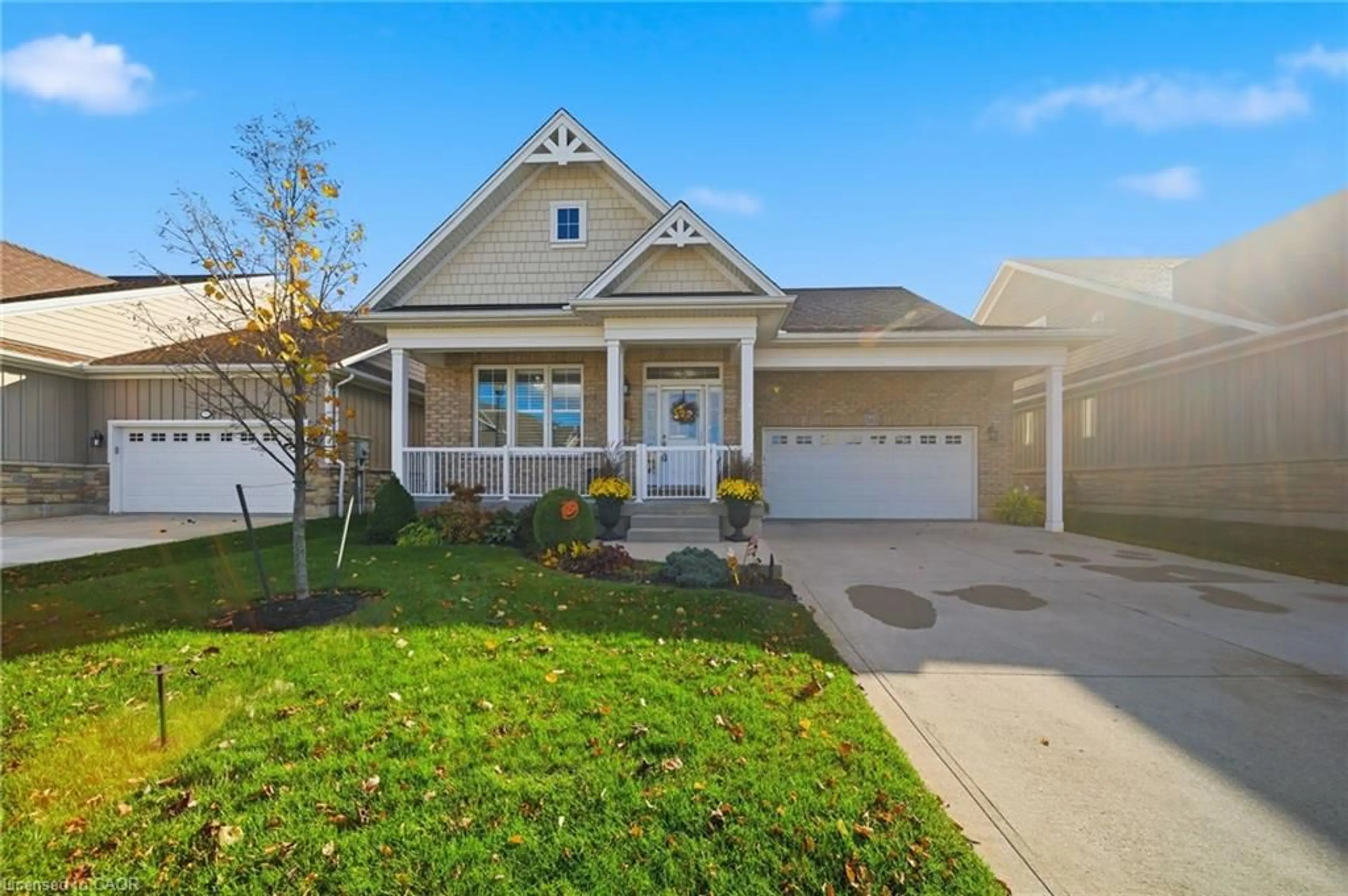 Home with vinyl exterior material, street for 34 Regatta Dr #89, Port Dover Ontario N0A 1N3