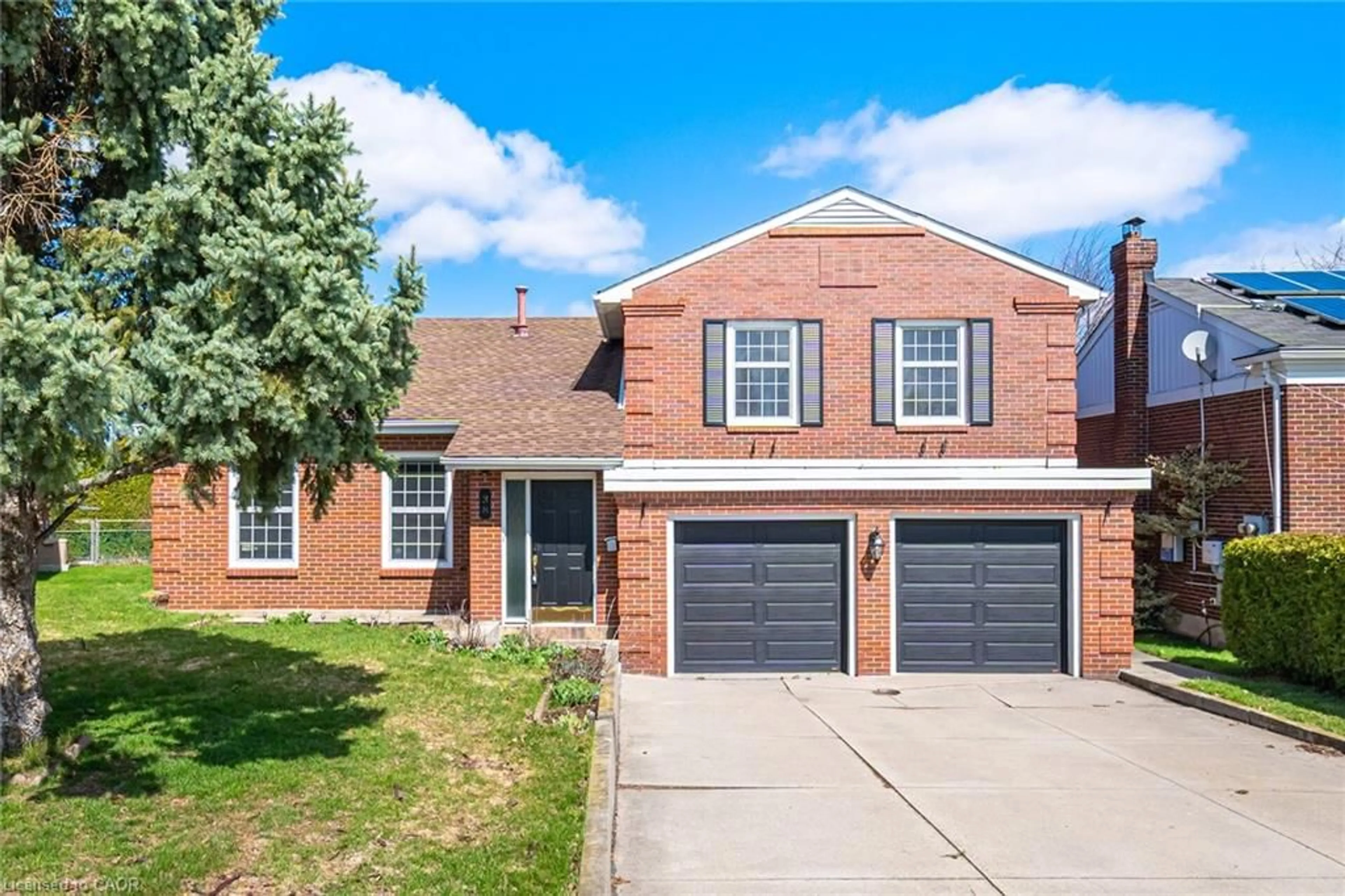 Home with brick exterior material, street for 38 Leclaire St, Hamilton Ontario L9C 5X3