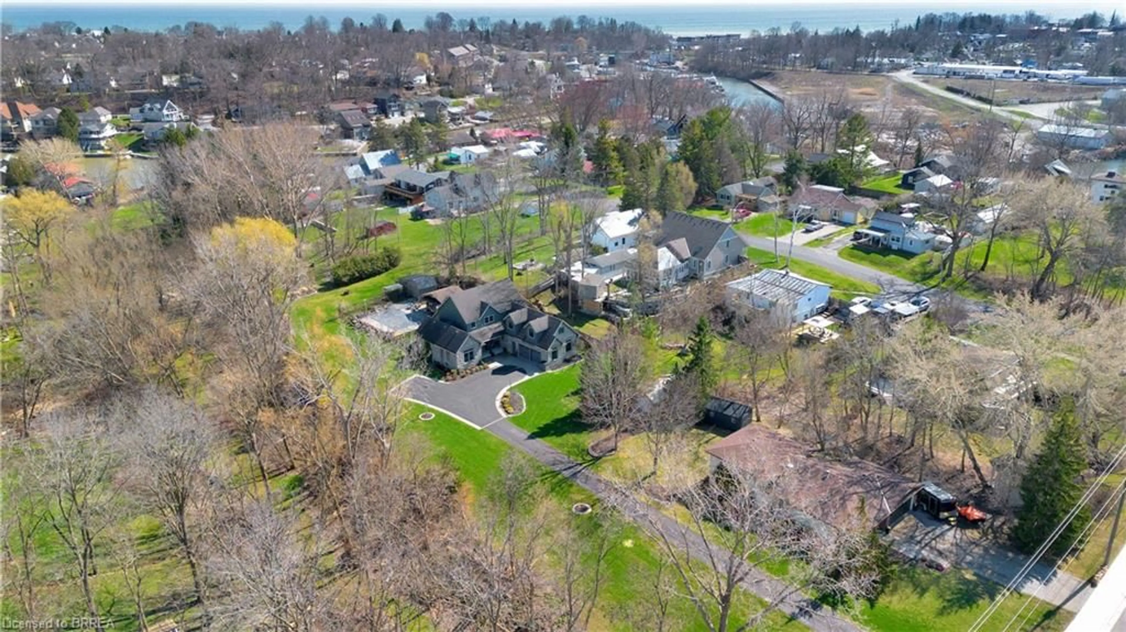 A pic from outside/outdoor area/front of a property/back of a property/a pic from drone, street for 38 Silver Lake Dr, Port Dover Ontario N0A 1N6