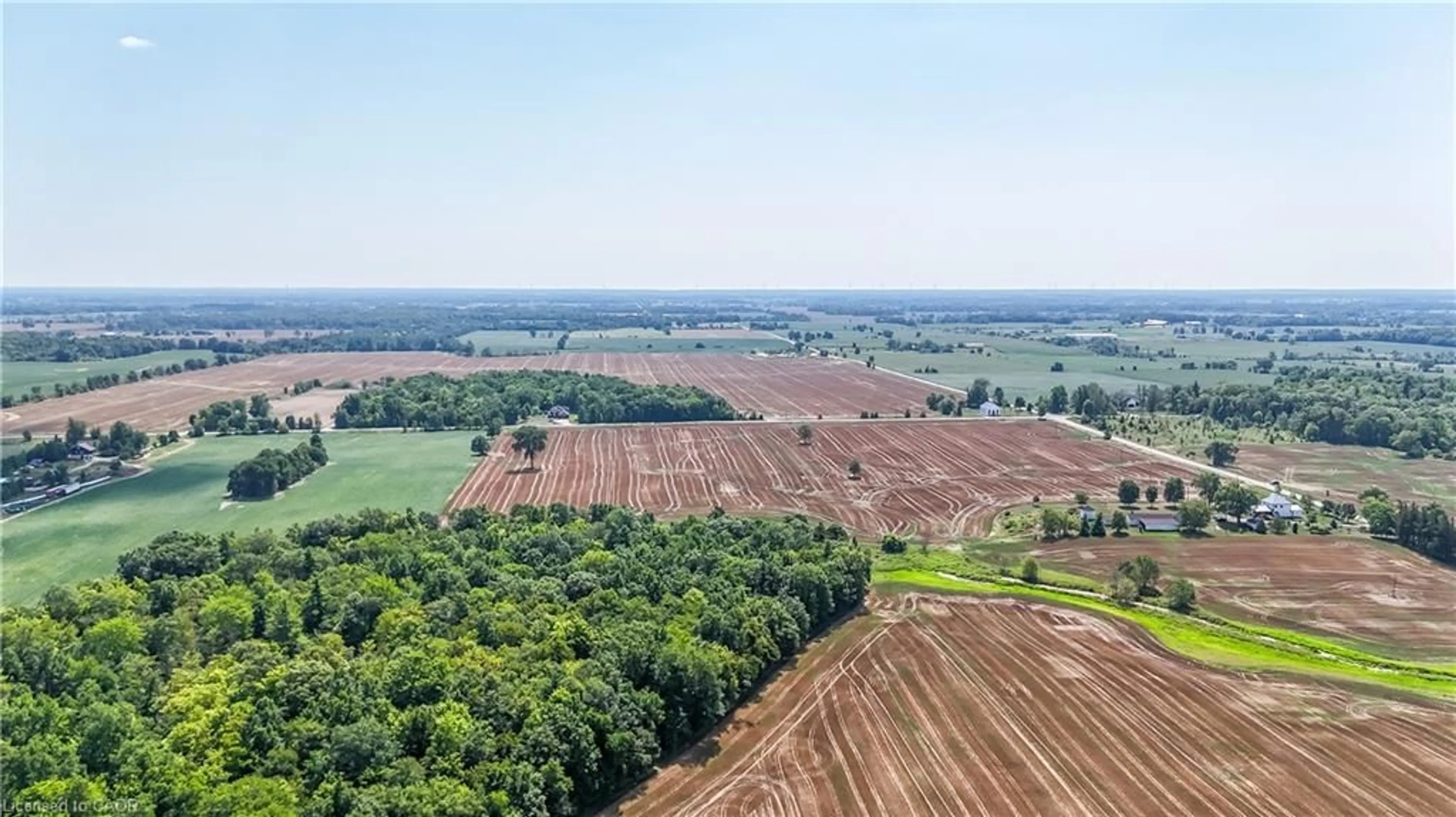A pic from outside/outdoor area/front of a property/back of a property/a pic from drone, forest/trees view for 304 Turnbull Rd, Canfield Ontario N0A 1C0
