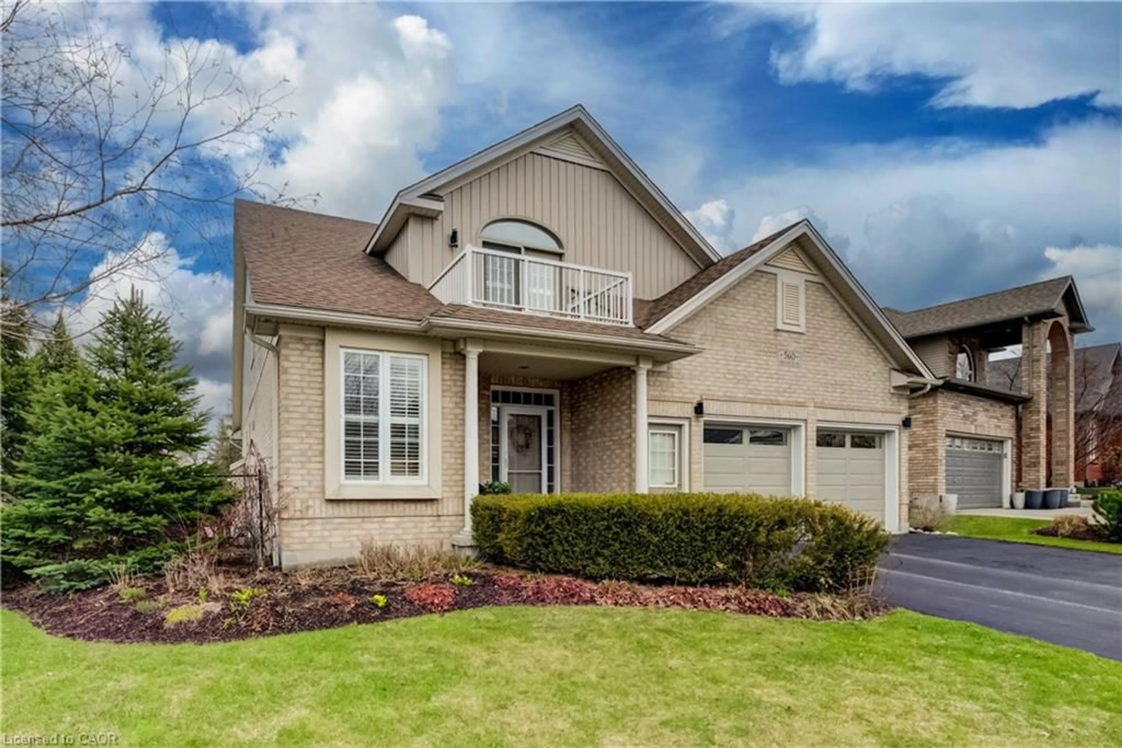 Home with brick exterior material, street for 560 Springwater Dr, Waterloo Ontario N2V 2K6