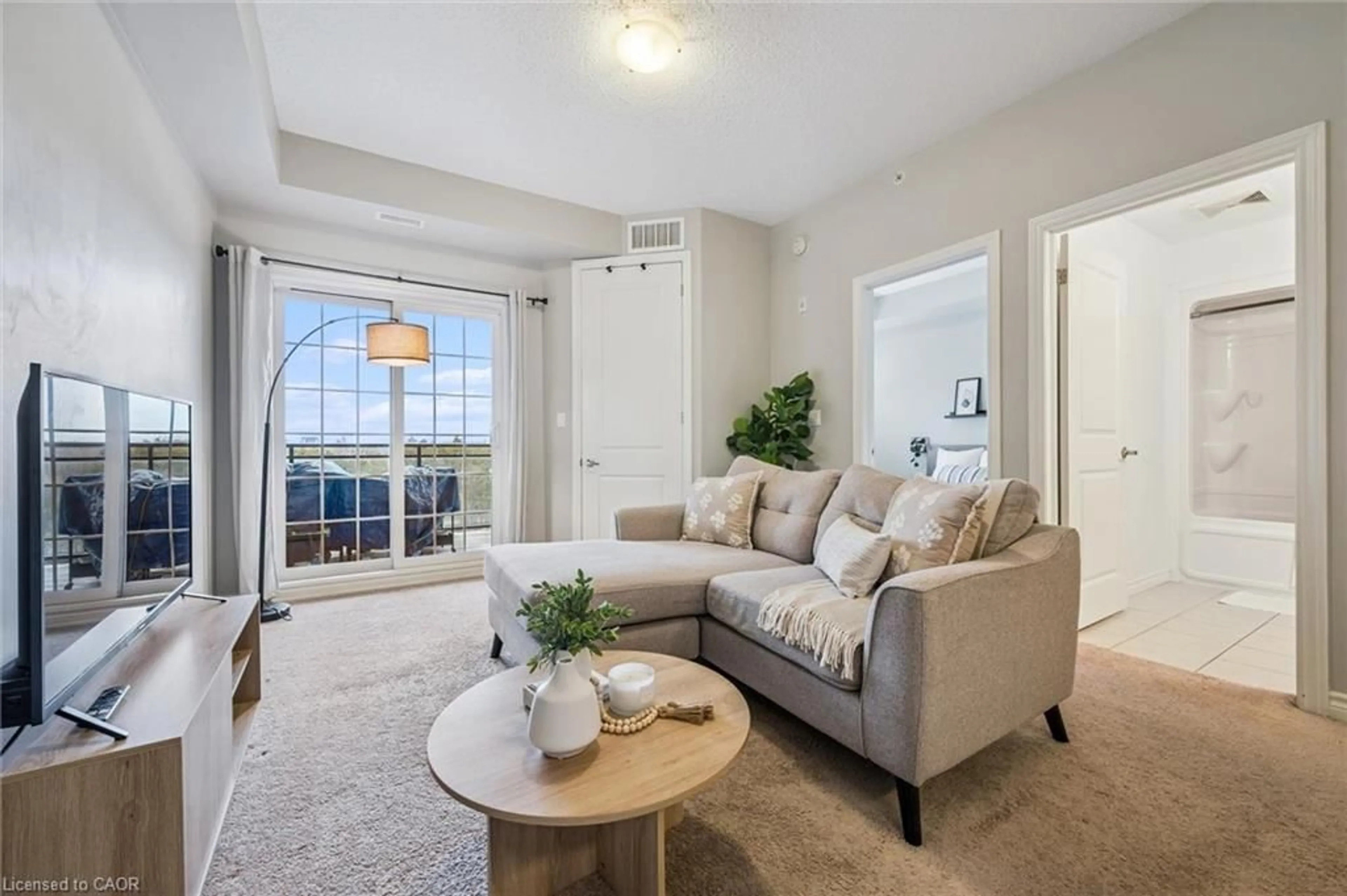 Living room with furniture, unknown for 1077 Gordon St #429, Guelph Ontario N1L 1H2