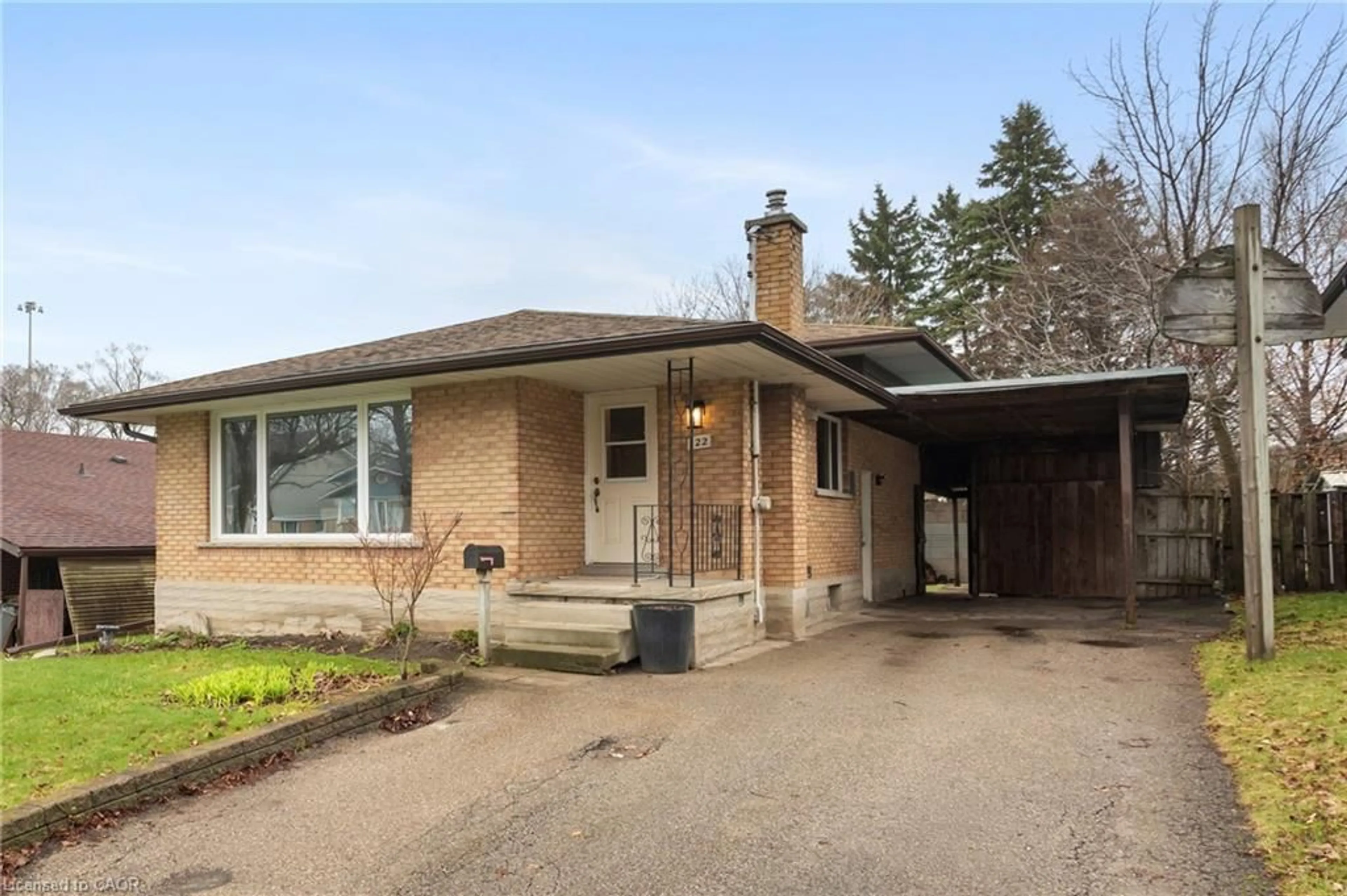 Home with brick exterior material, street for 122 Sweetbriar Dr, Kitchener Ontario N2M 4S6