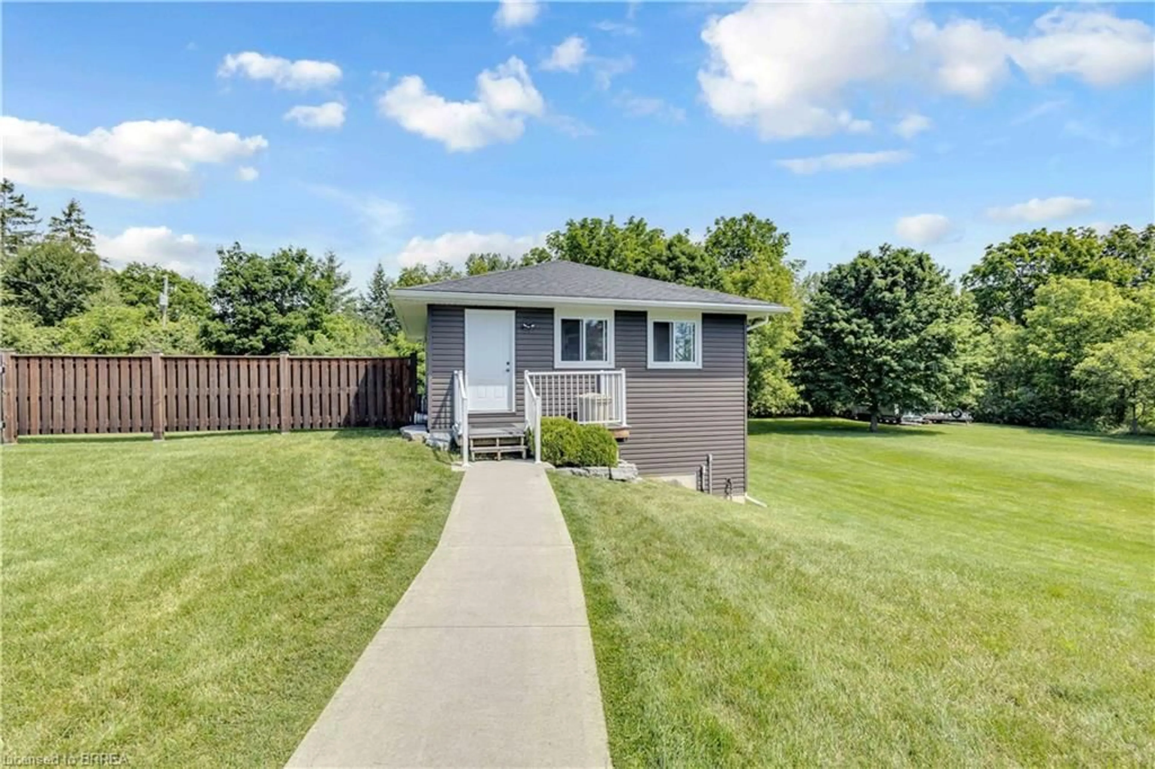 Home with vinyl exterior material, street for 16 Sixth Concession Rd, Burford Ontario N3R 0B8
