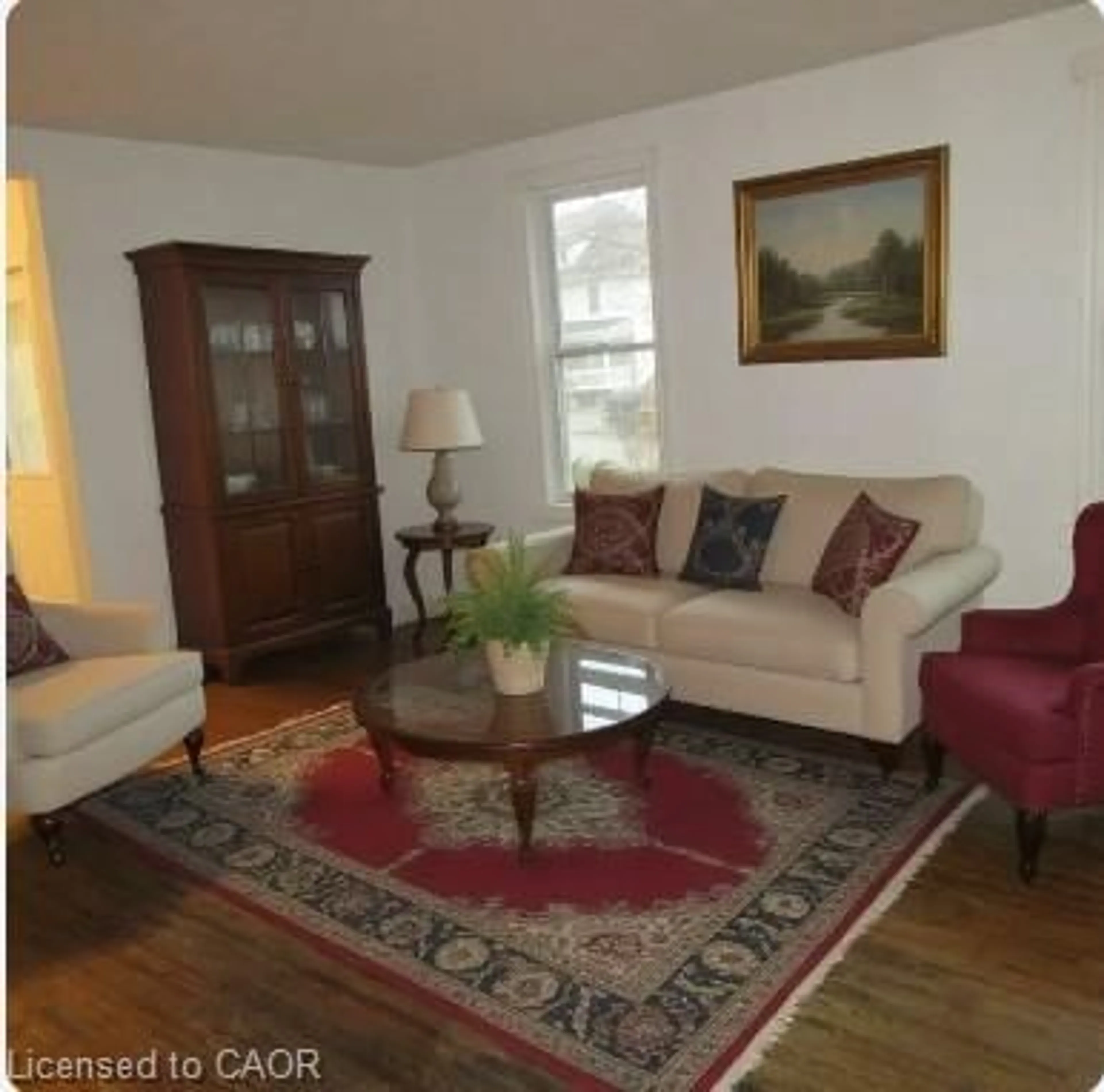 Living room with furniture, carpet floor for 713 Cedar St, Dunnville Ontario N1A 2J9