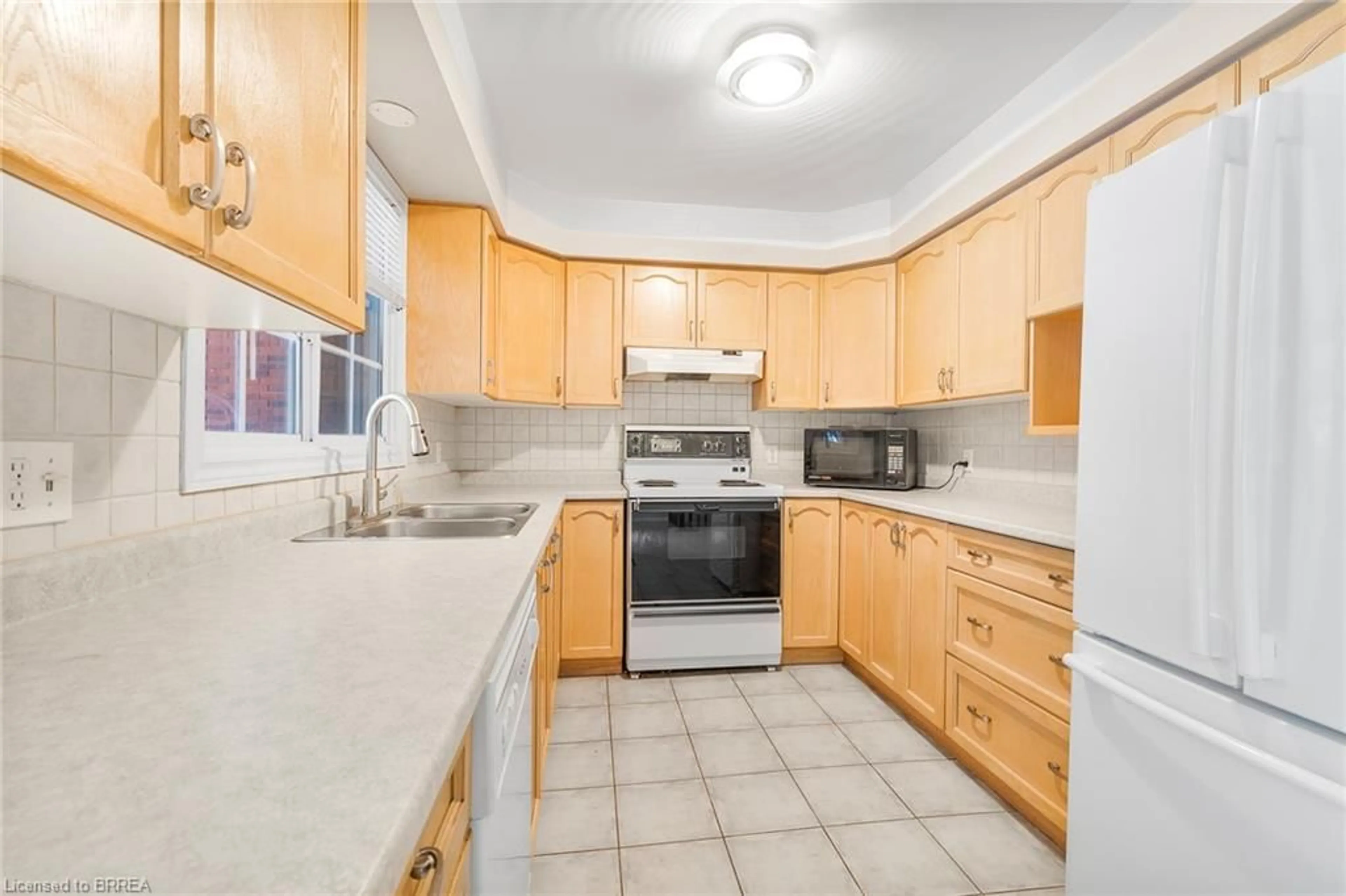 Standard kitchen, ceramic/tile floor for 570 West St #2, Brantford Ontario N3R 7Y7
