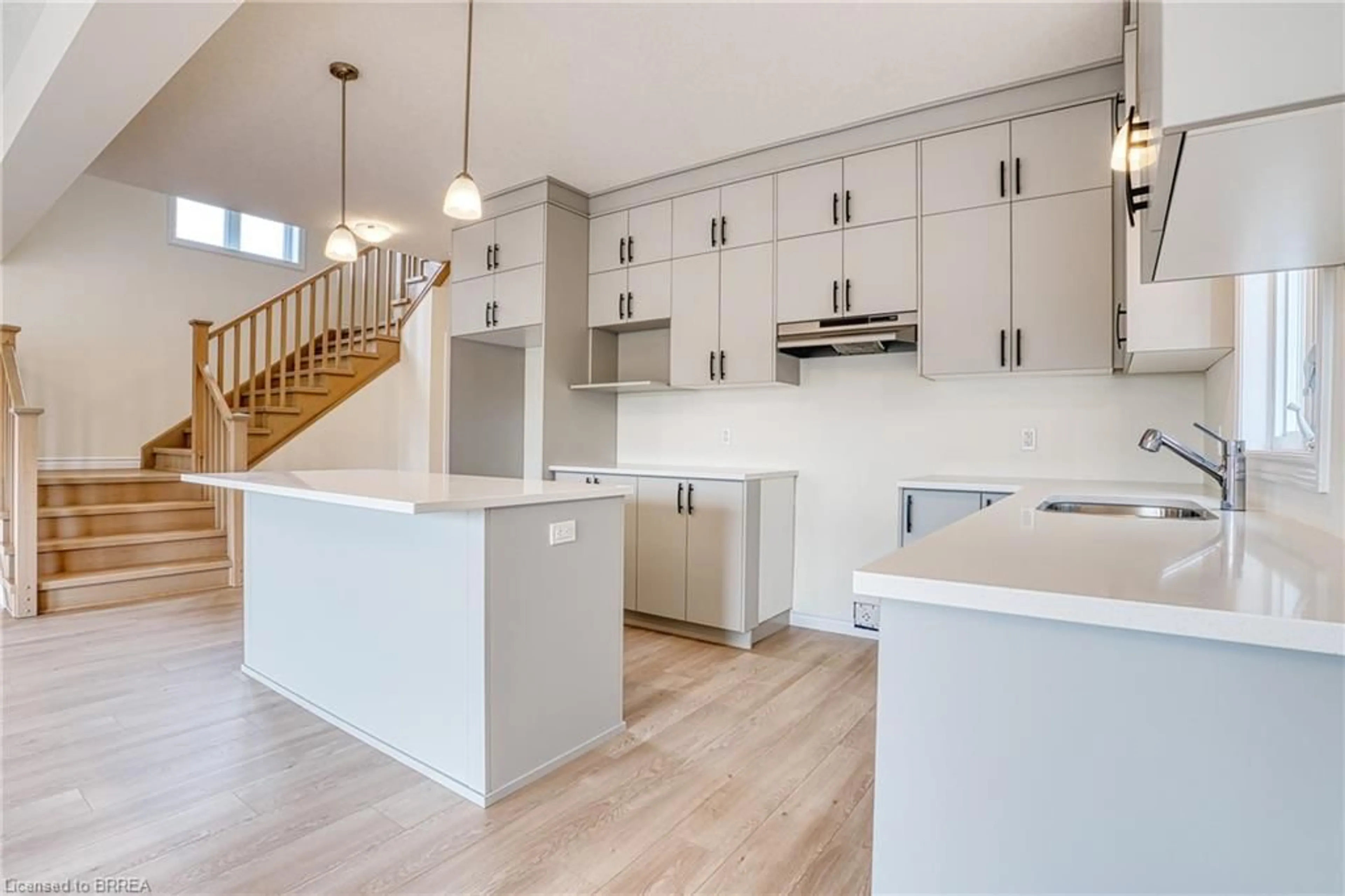 Open concept kitchen, wood/laminate floor for 30 Ford Dr, Stratford Ontario N5A 0L3