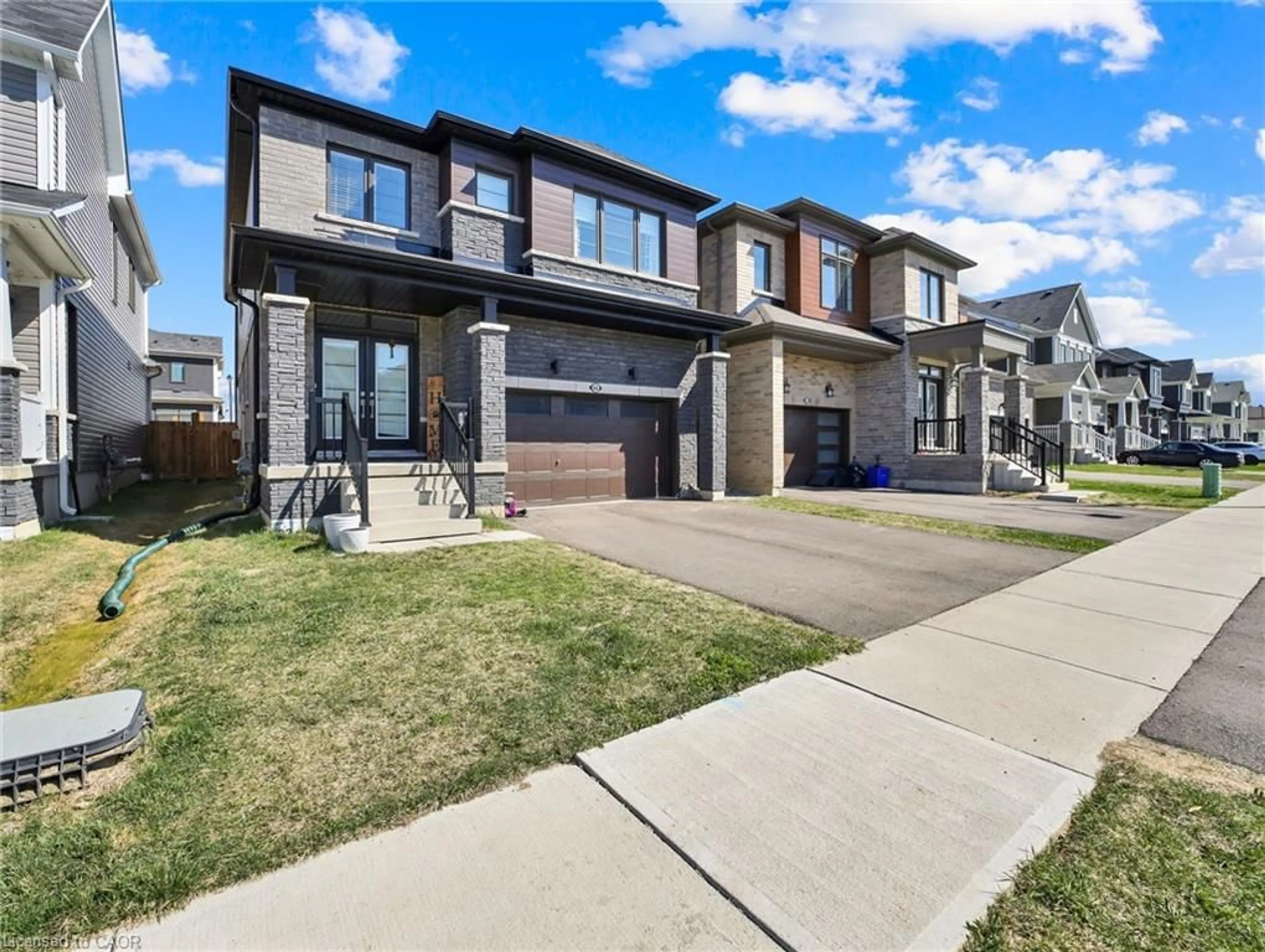 Home with brick exterior material, street for 66 Lillian Way, Caledonia Ontario N3W 0E7