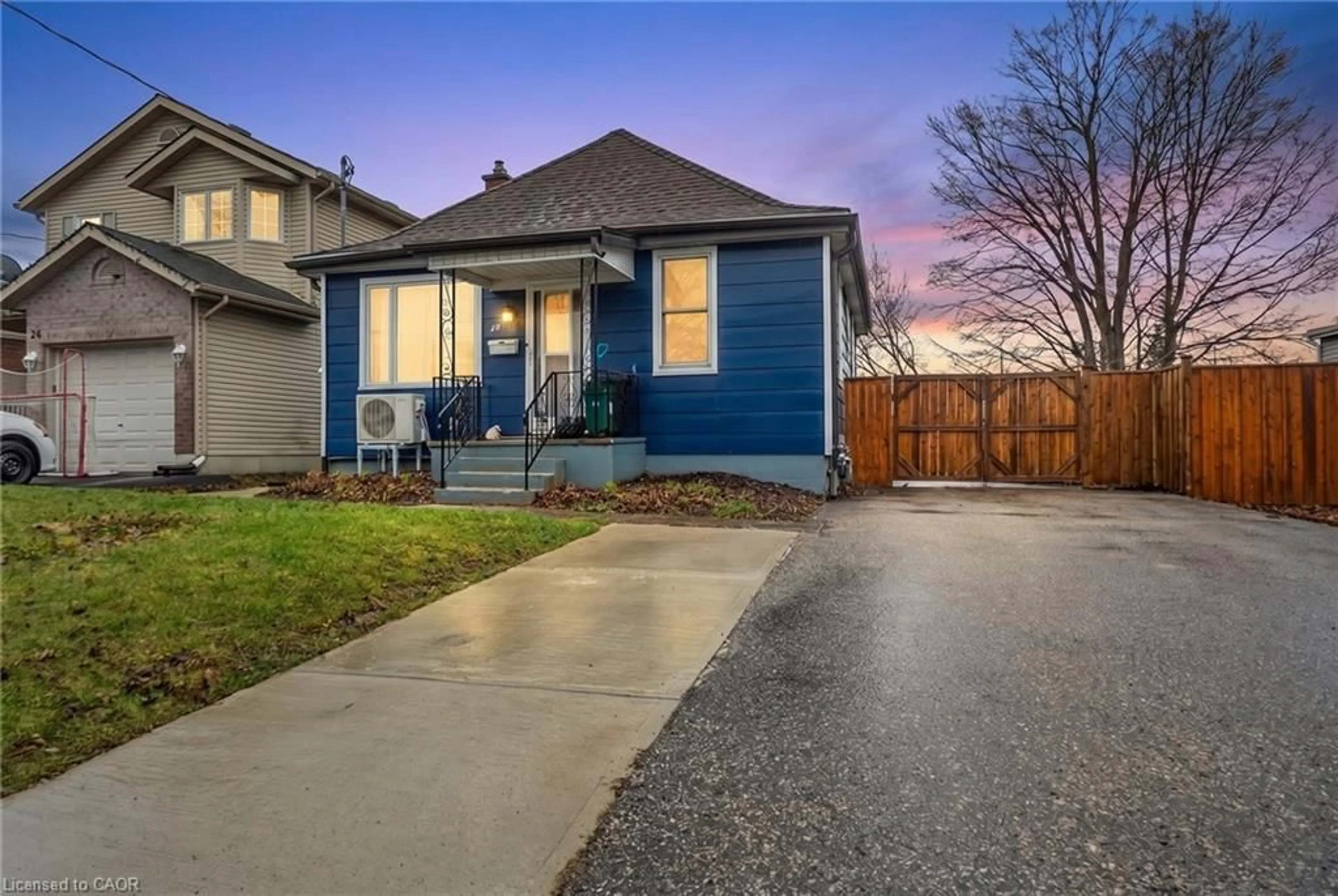 Home with vinyl exterior material, street for 26 Stafford St, Woodstock Ontario N4S 3Z6