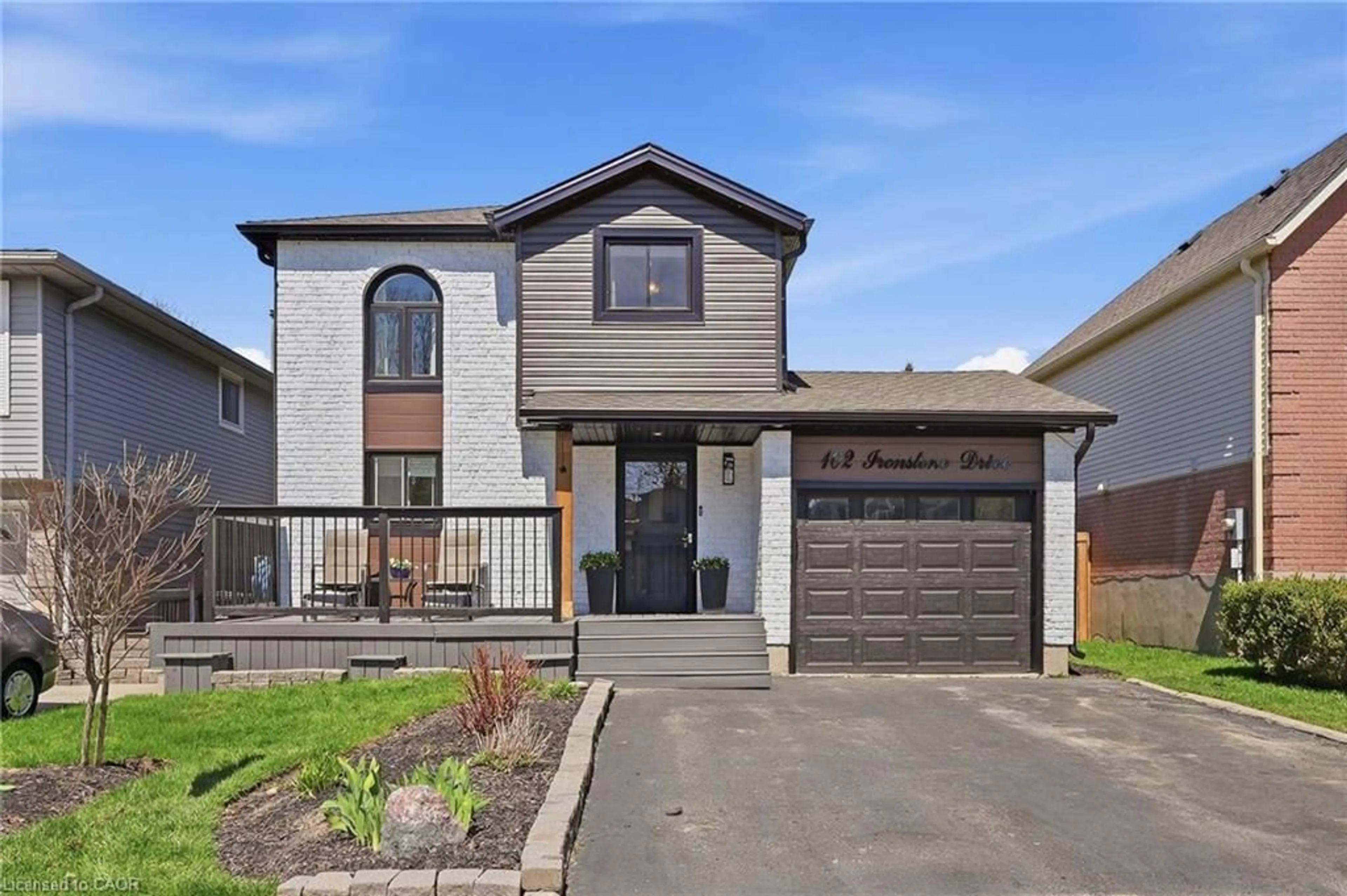 Home with brick exterior material, street for 102 Ironstone Dr, Cambridge Ontario N1P 1A4