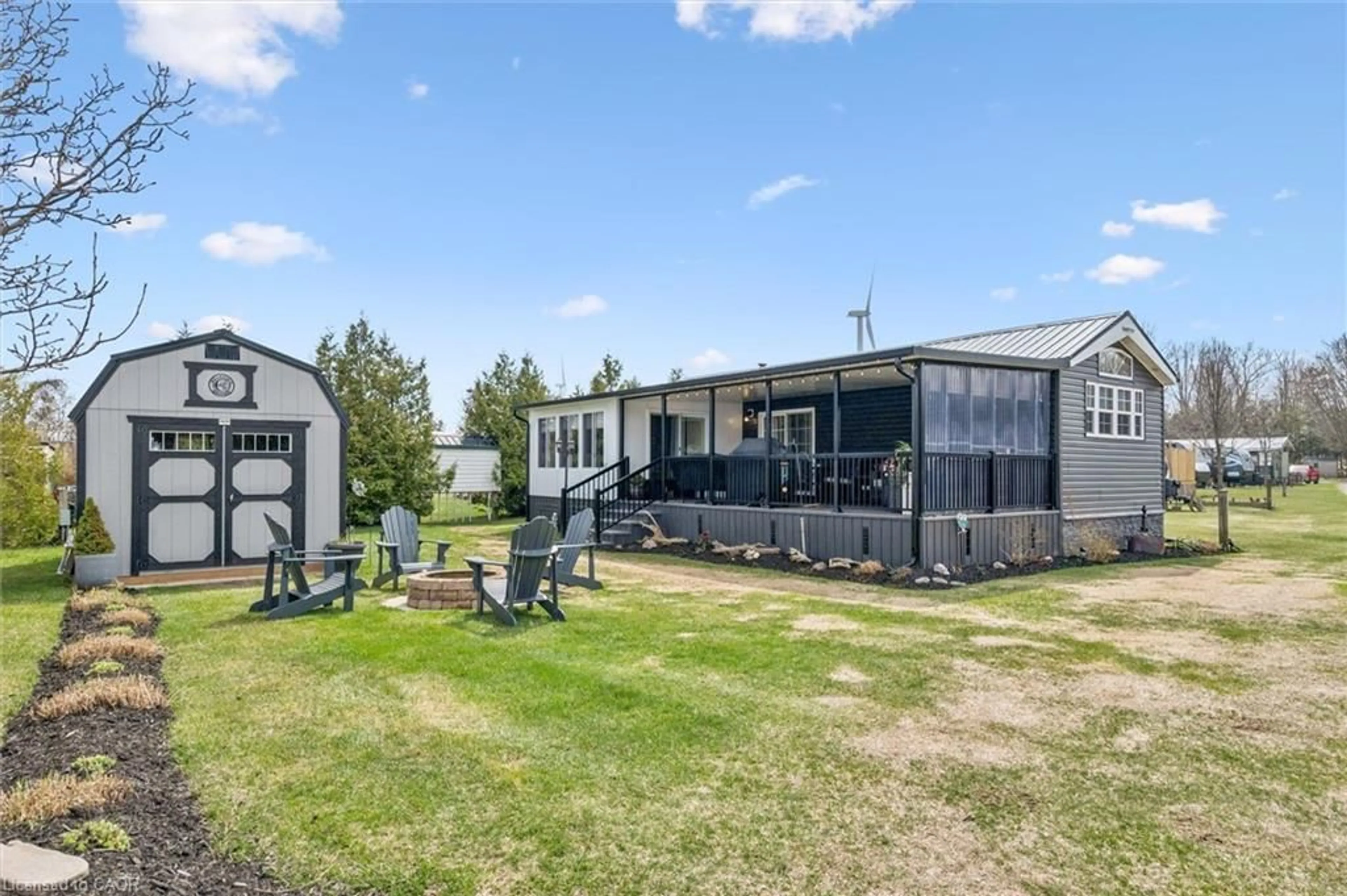 A pic from outside/outdoor area/front of a property/back of a property/a pic from drone, unknown for 930 Lakeshore Rd #83, Norfolk County Ontario N0J 1T0