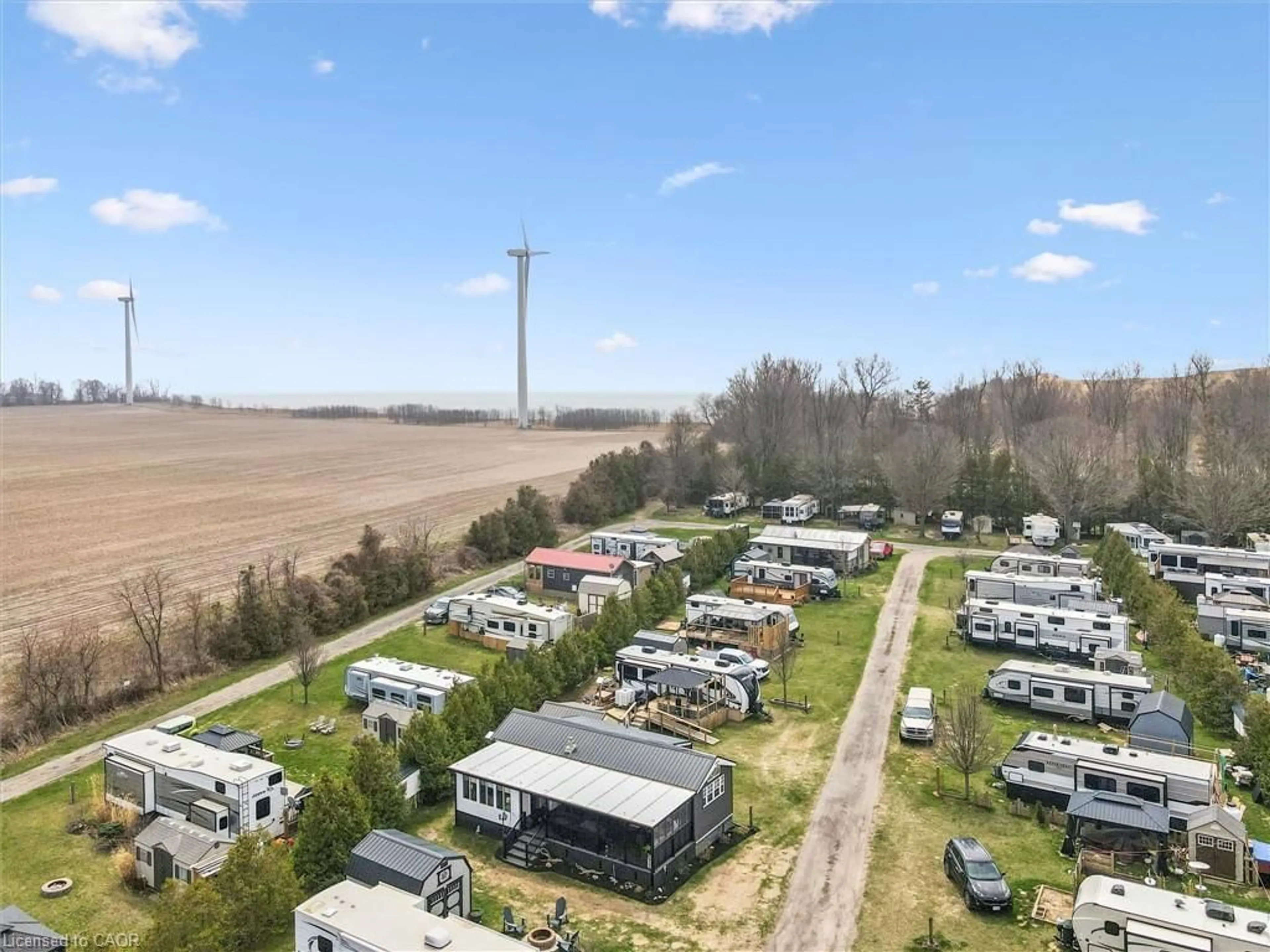 A pic from outside/outdoor area/front of a property/back of a property/a pic from drone, unknown for 930 Lakeshore Rd #83, Norfolk County Ontario N0J 1T0