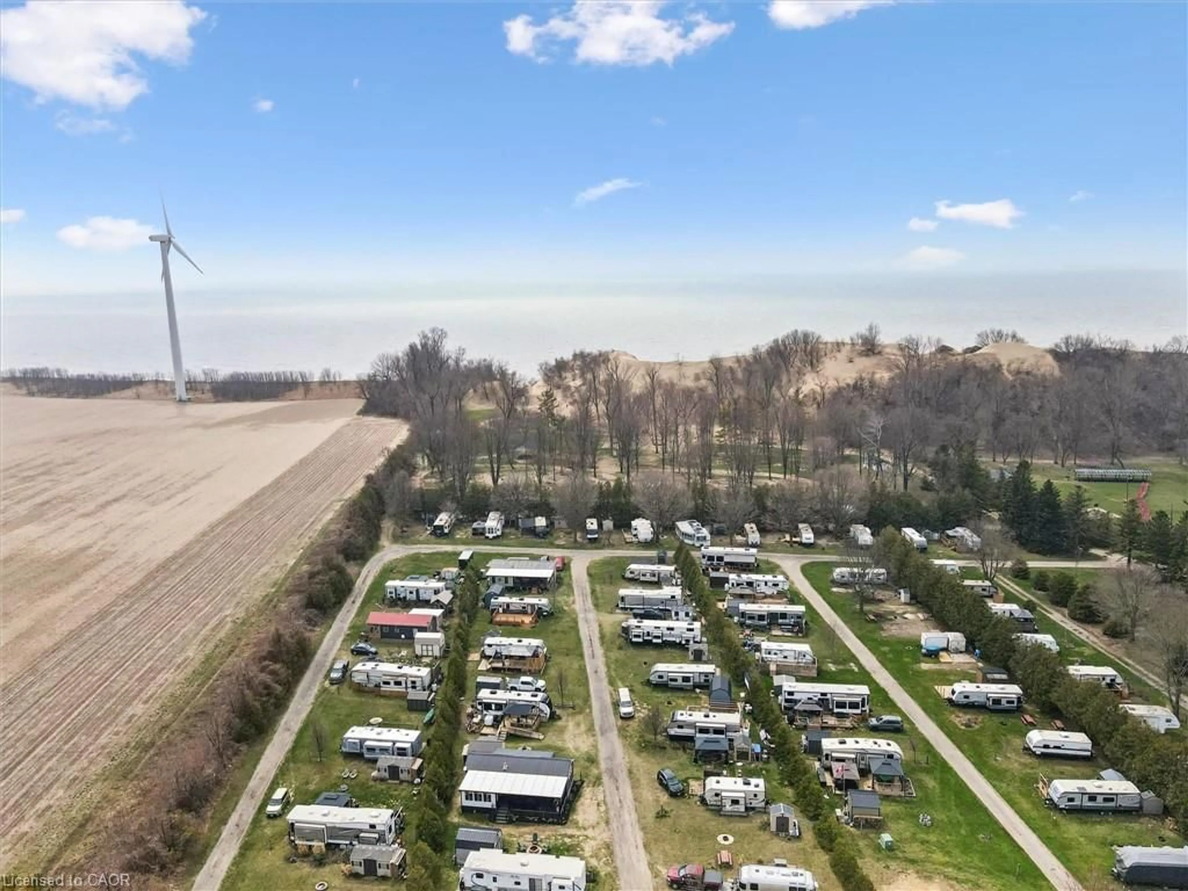 A pic from outside/outdoor area/front of a property/back of a property/a pic from drone, unknown for 930 Lakeshore Rd #83, Norfolk County Ontario N0J 1T0