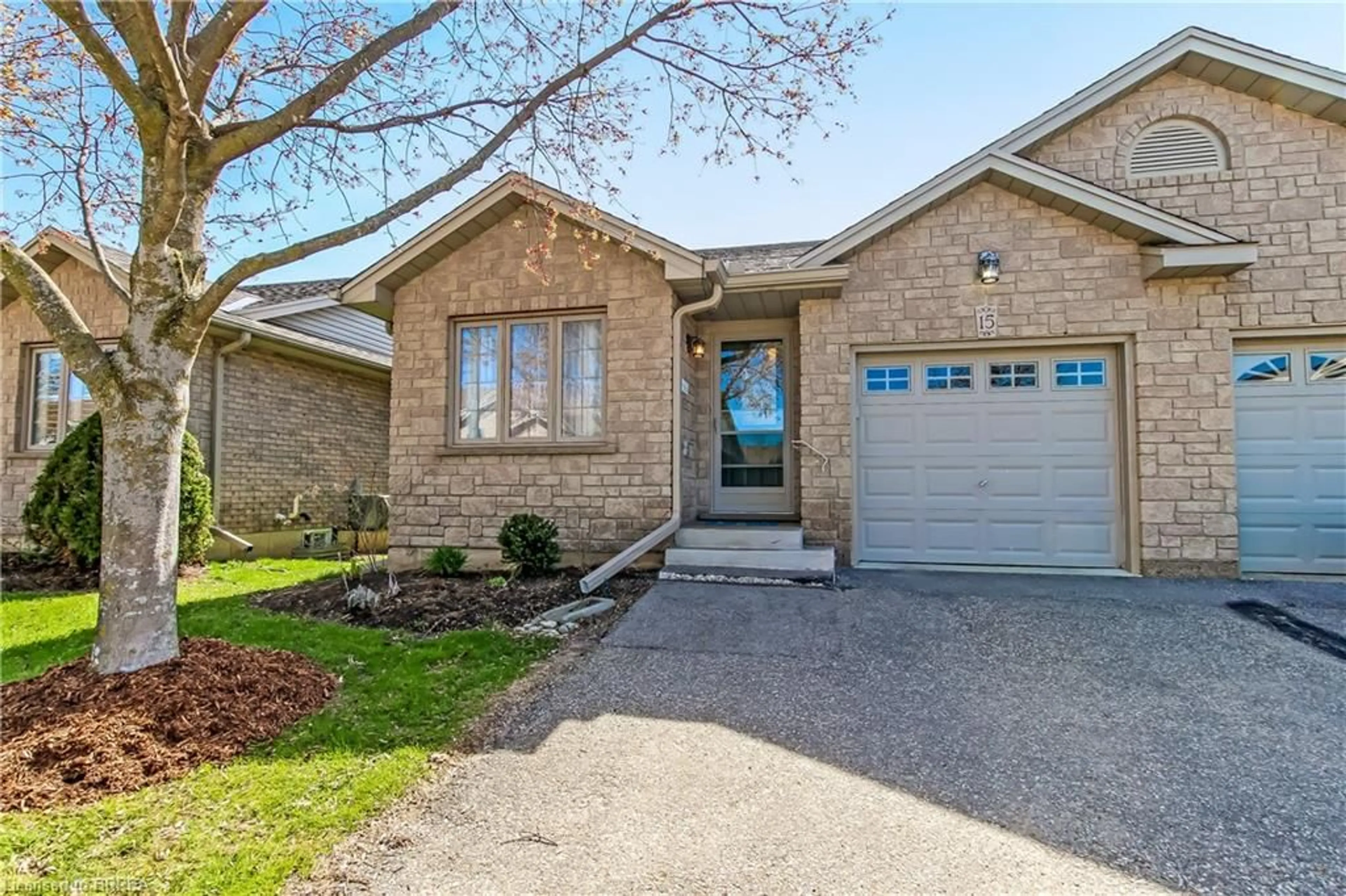 Home with brick exterior material, street for 19 Hanlon Pl #15, Paris Ontario N3L 4E7
