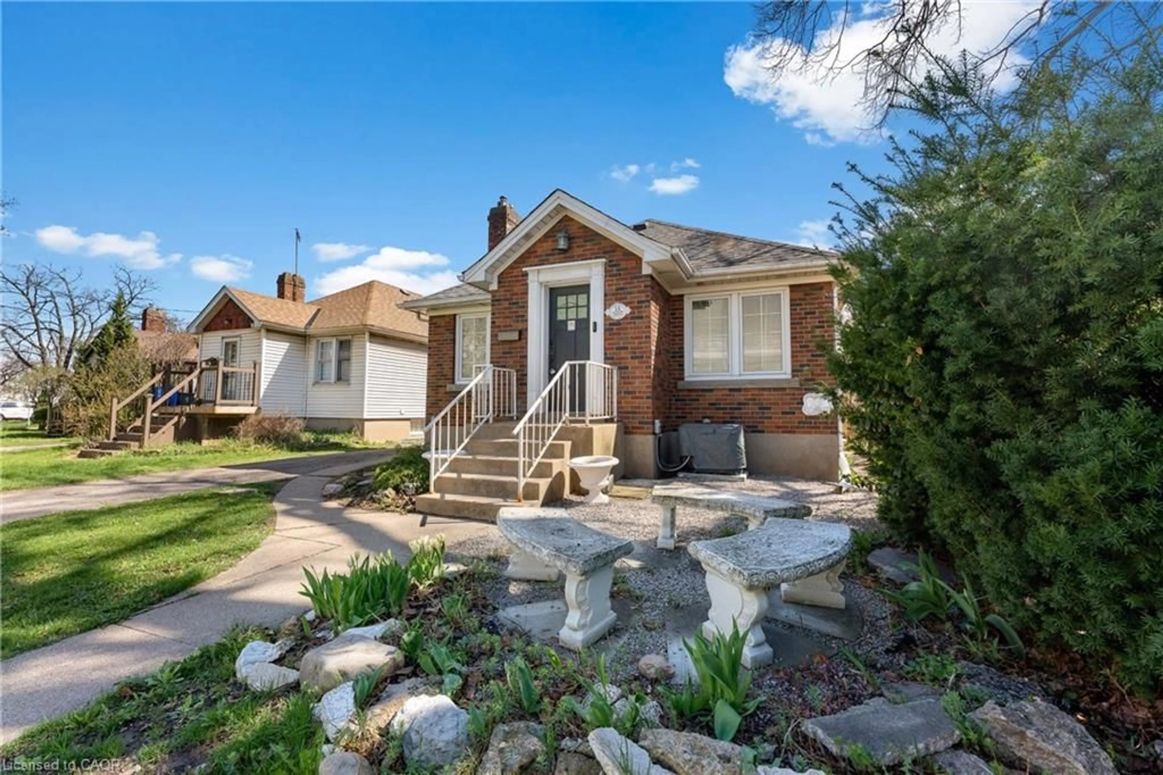Home with brick exterior material, street for 14 Dunlop Dr, St. Catharines Ontario L2R 1A3