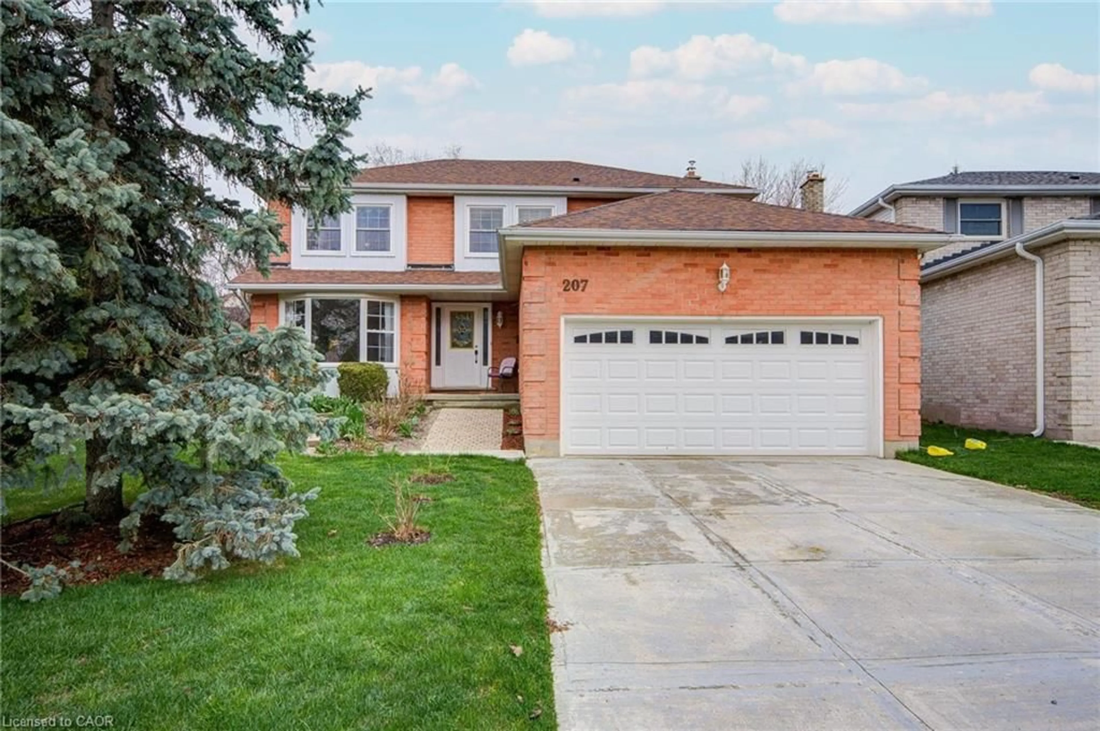 Home with brick exterior material, street for 207 Stoke Dr, Kitchener Ontario N2N 2C3