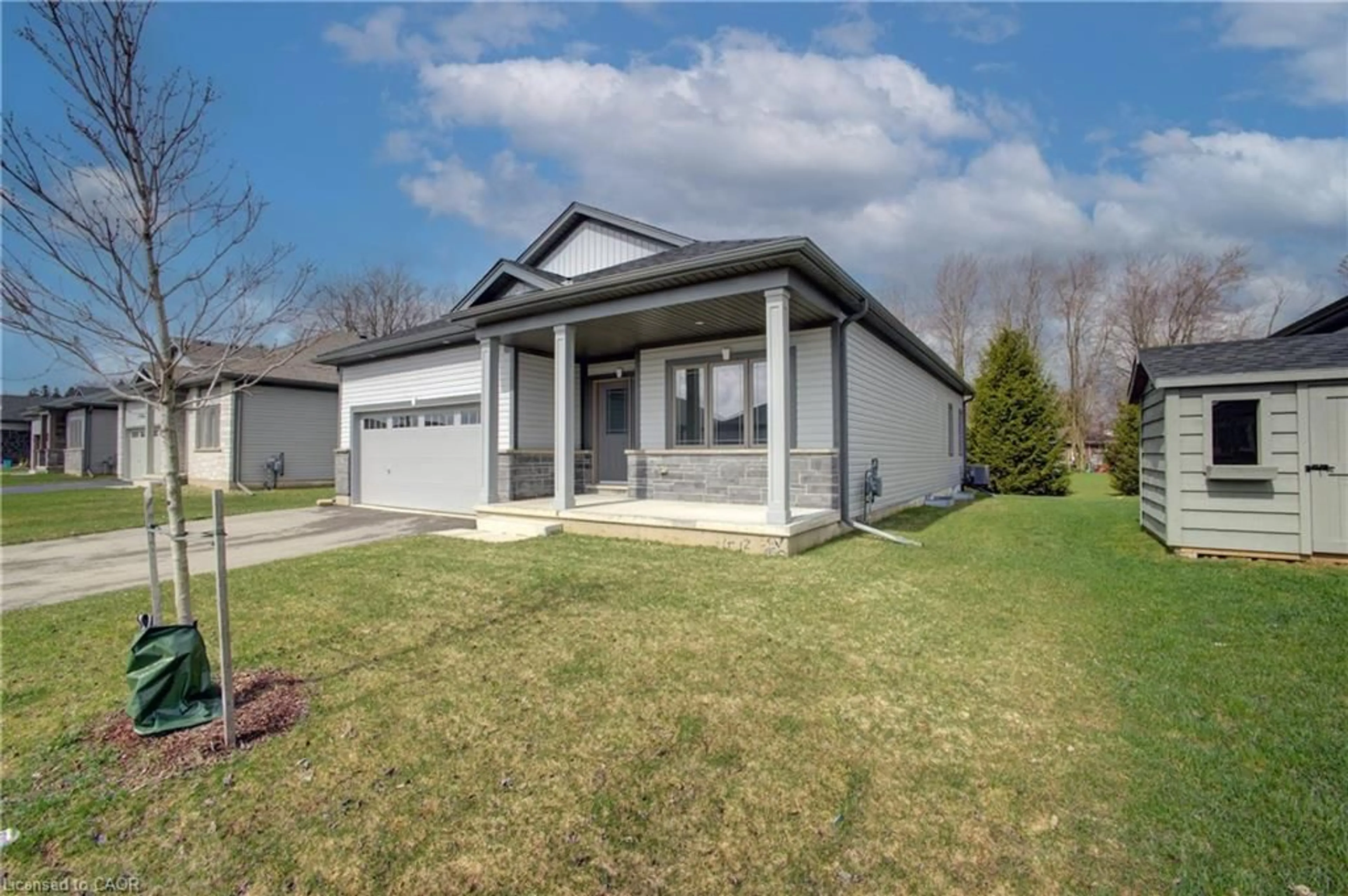 Home with vinyl exterior material, street for 150 Ellen St, Atwood Ontario N0G 1B0