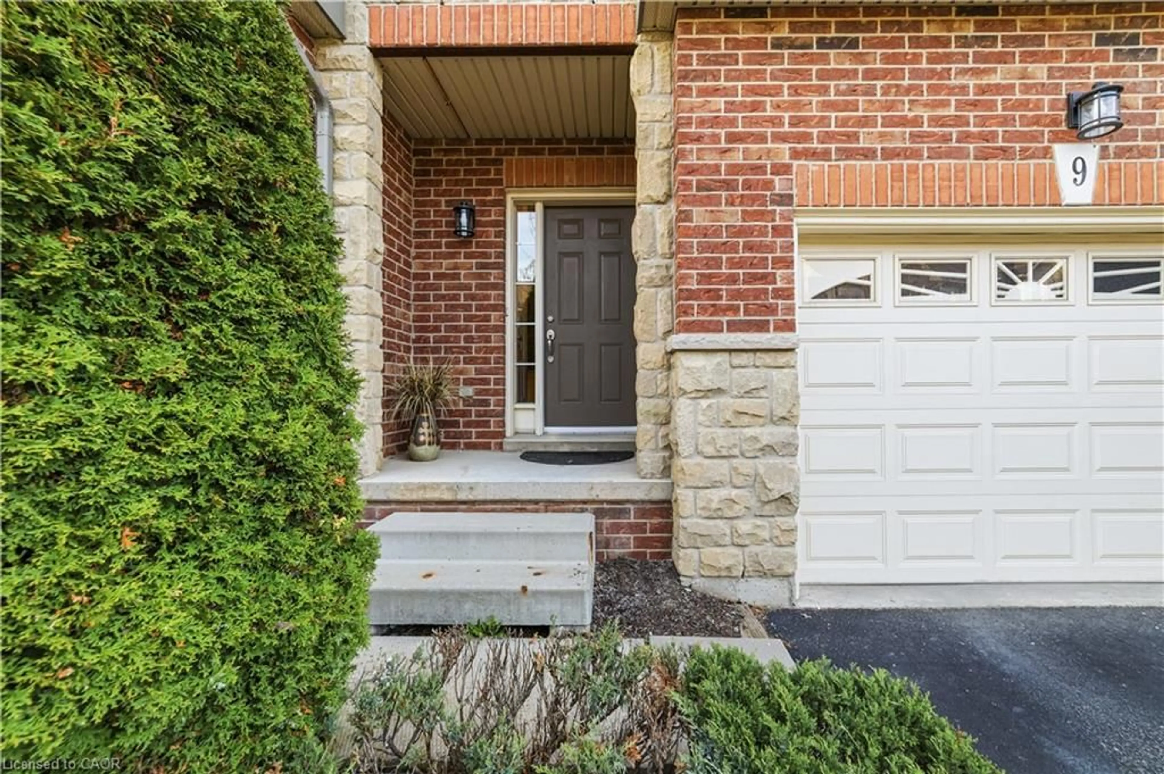 Home with brick exterior material, street for 9 Liddycoat Lane #18, Ancaster Ontario L9G 0A7