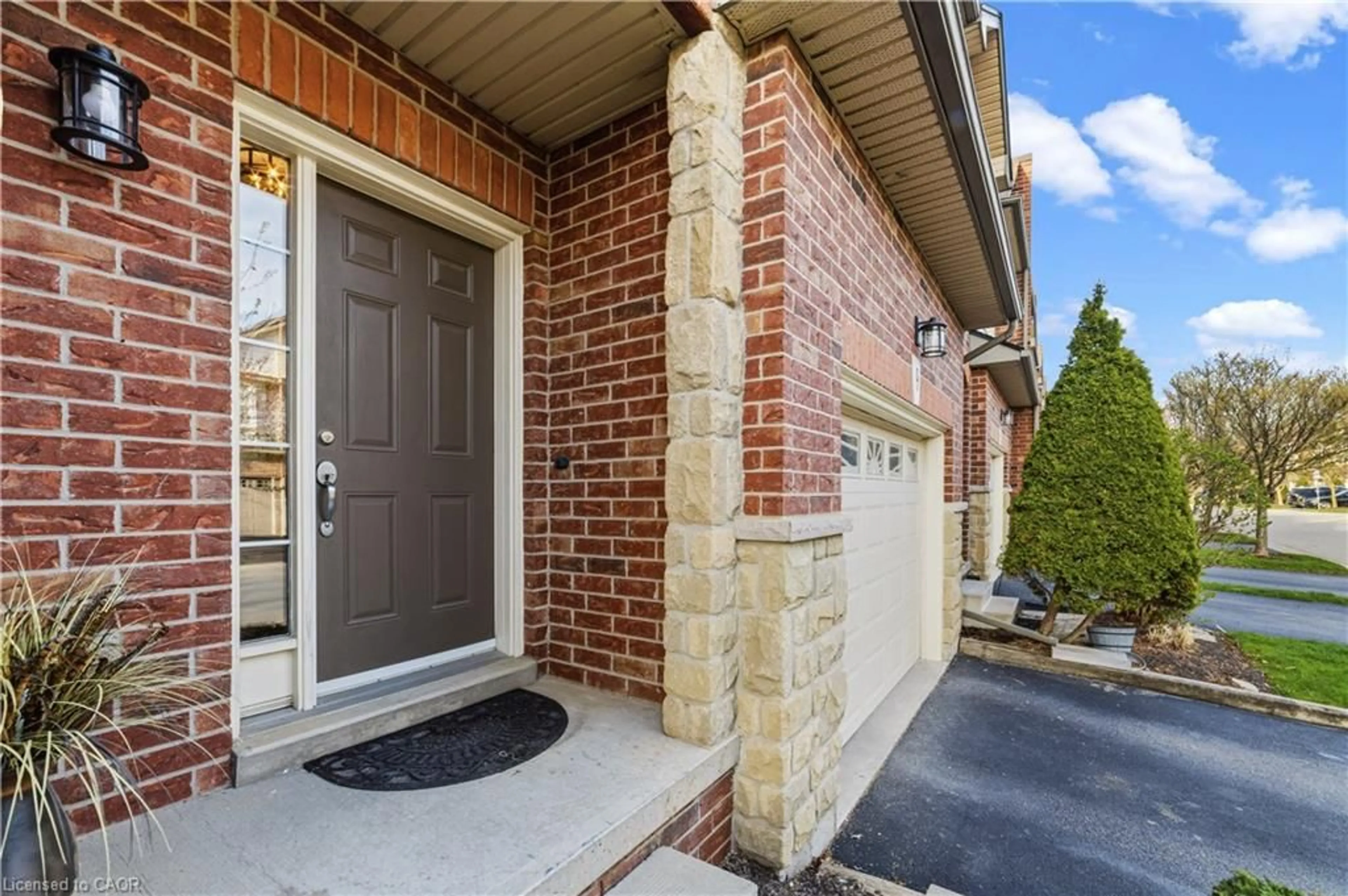Home with brick exterior material, street for 9 Liddycoat Lane #18, Ancaster Ontario L9G 0A7