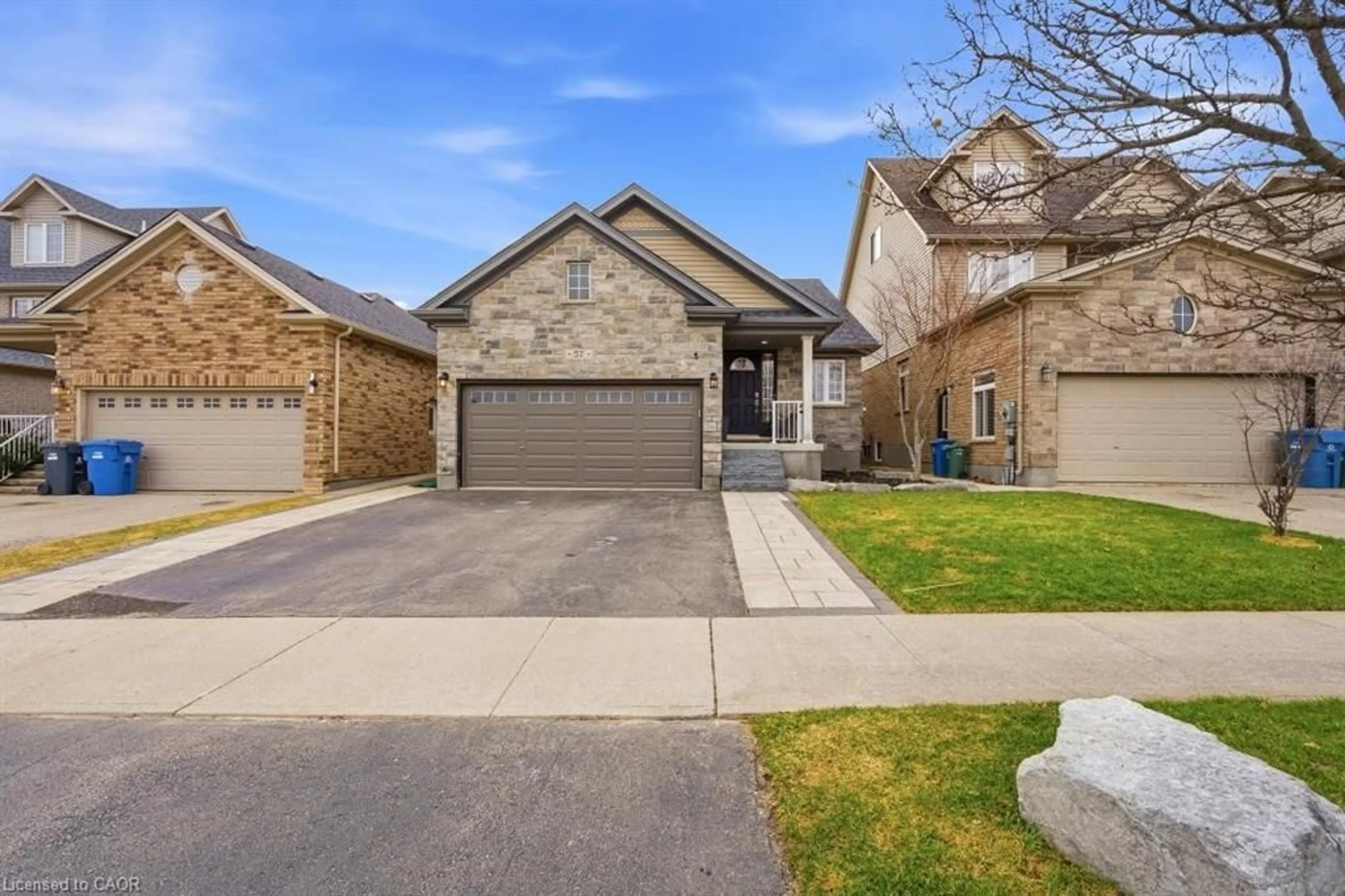 Home with brick exterior material, street for 57 Wideman Blvd, Guelph Ontario N1E 0H9