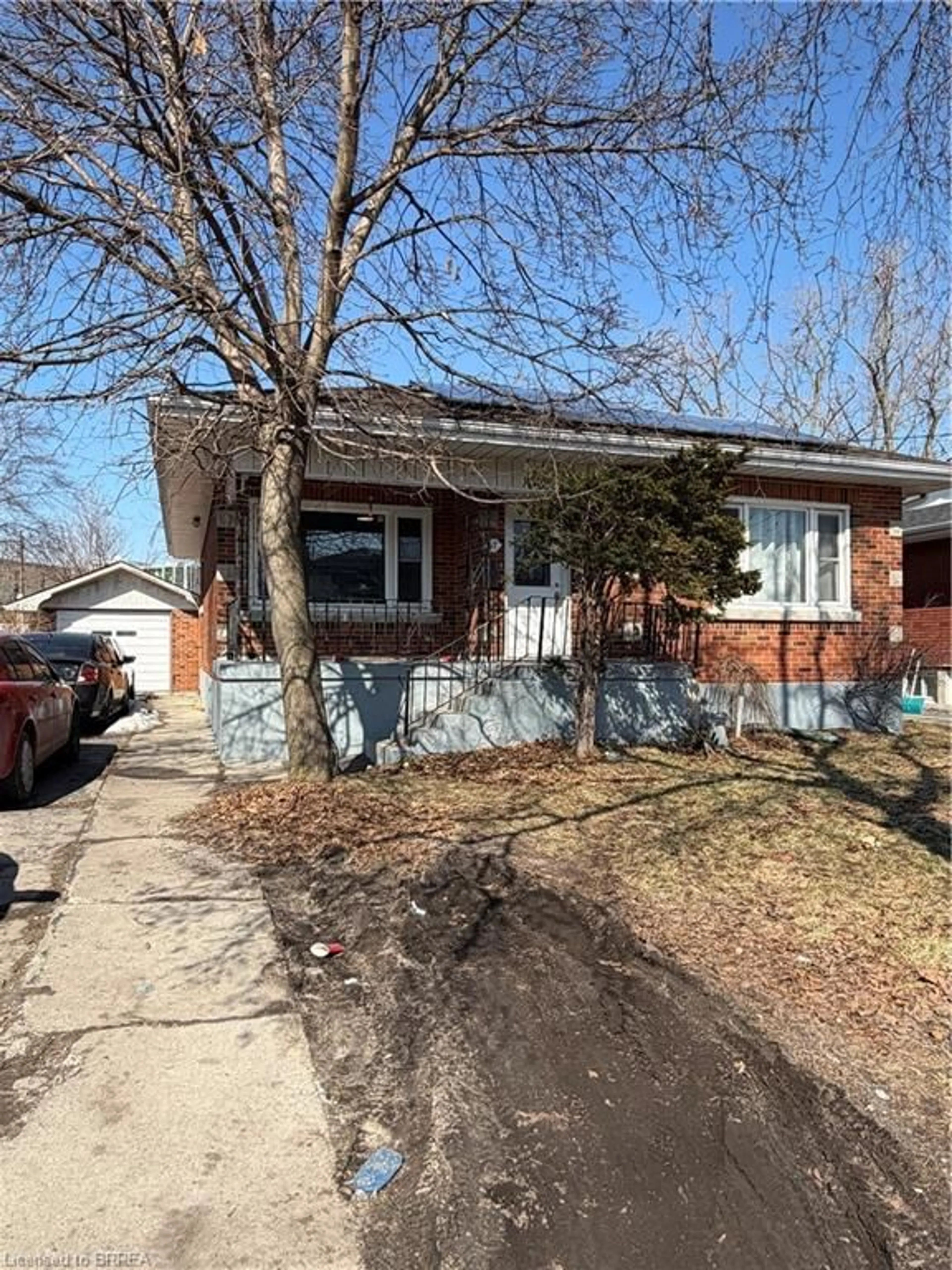 Home with brick exterior material, street for 17 Henry St, Brantford Ontario N3R 1Z9