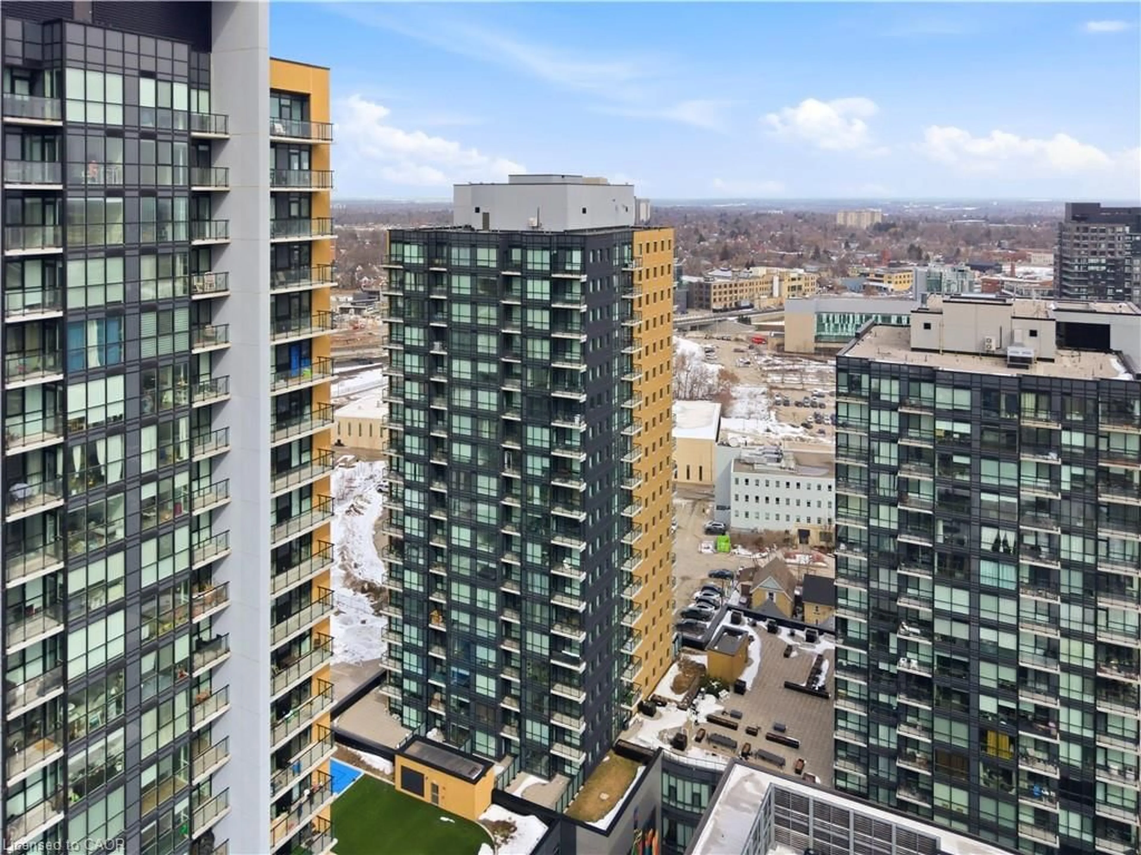 A pic from outside/outdoor area/front of a property/back of a property/a pic from drone, city buildings view from balcony for 104 Garment St #1206, Kitchener Ontario N2G 0C8