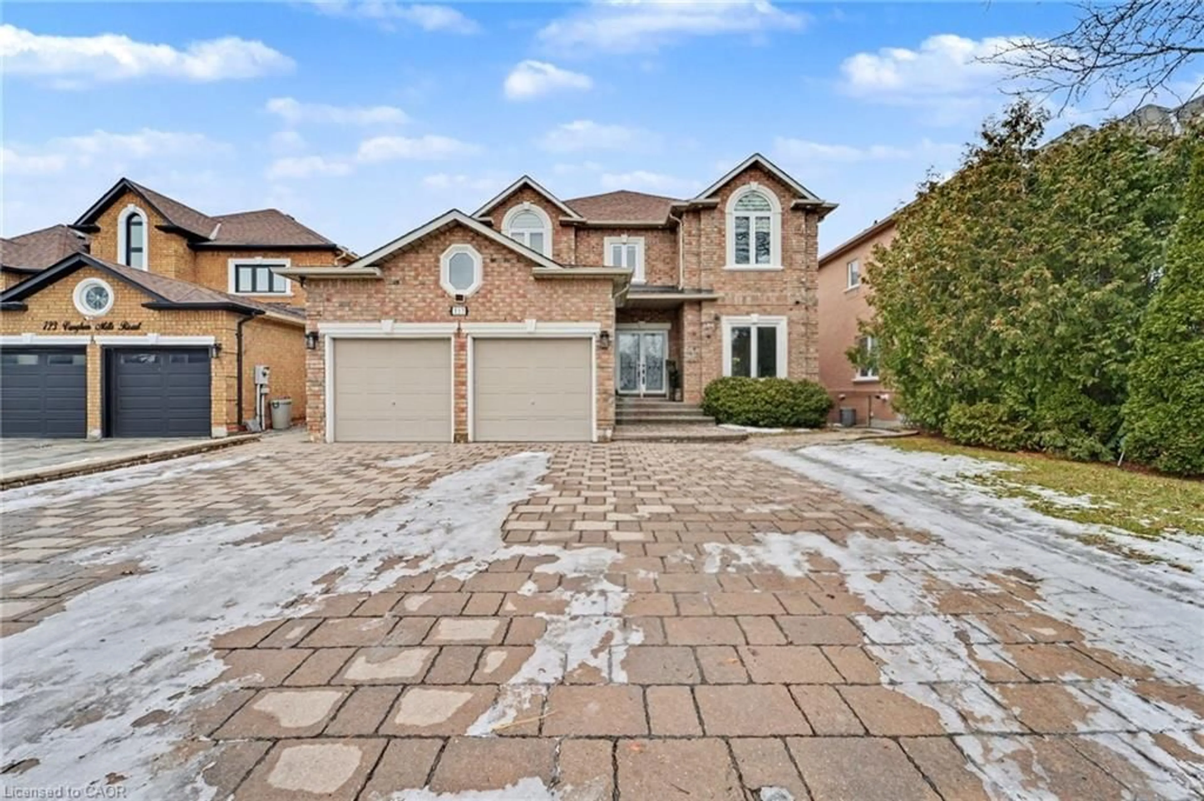 Home with brick exterior material, street for 717 Vaughan Mills Rd, Woodbridge Ontario L4H 1H6