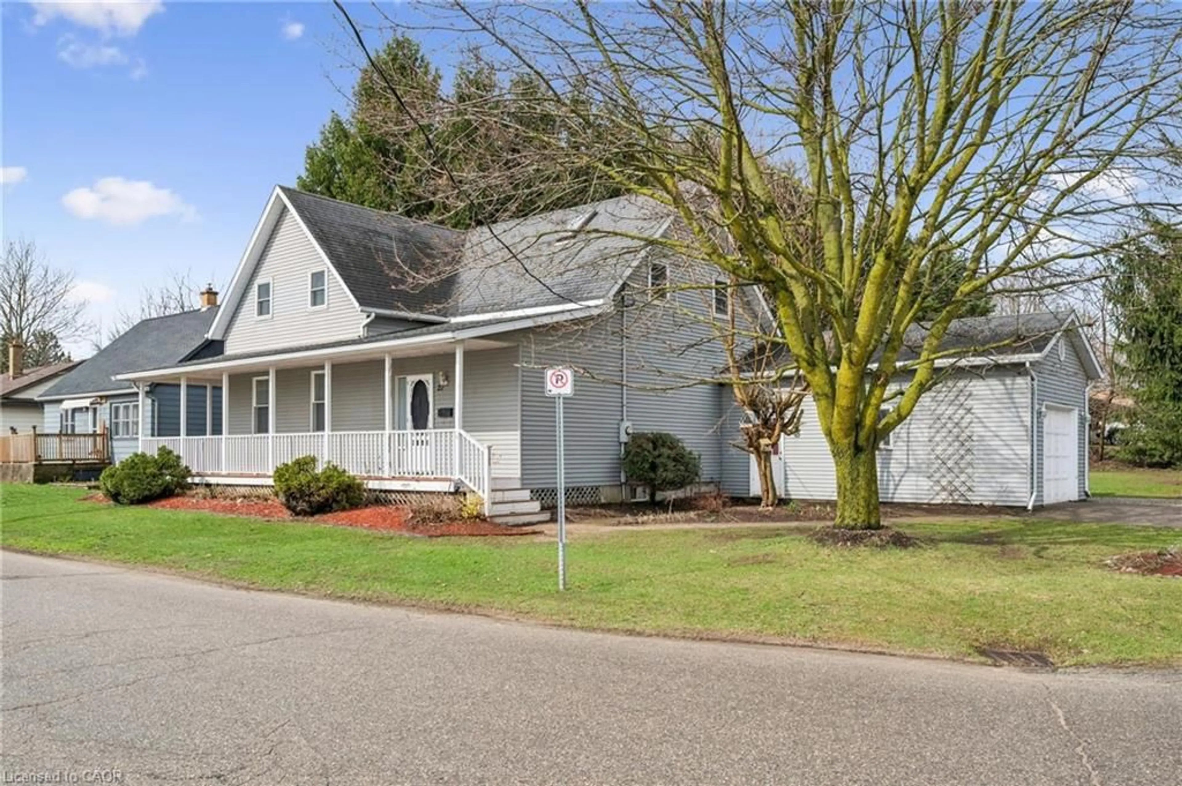 Home with vinyl exterior material, street for 22 Charles St, St. Clements Ontario N0B 2M0