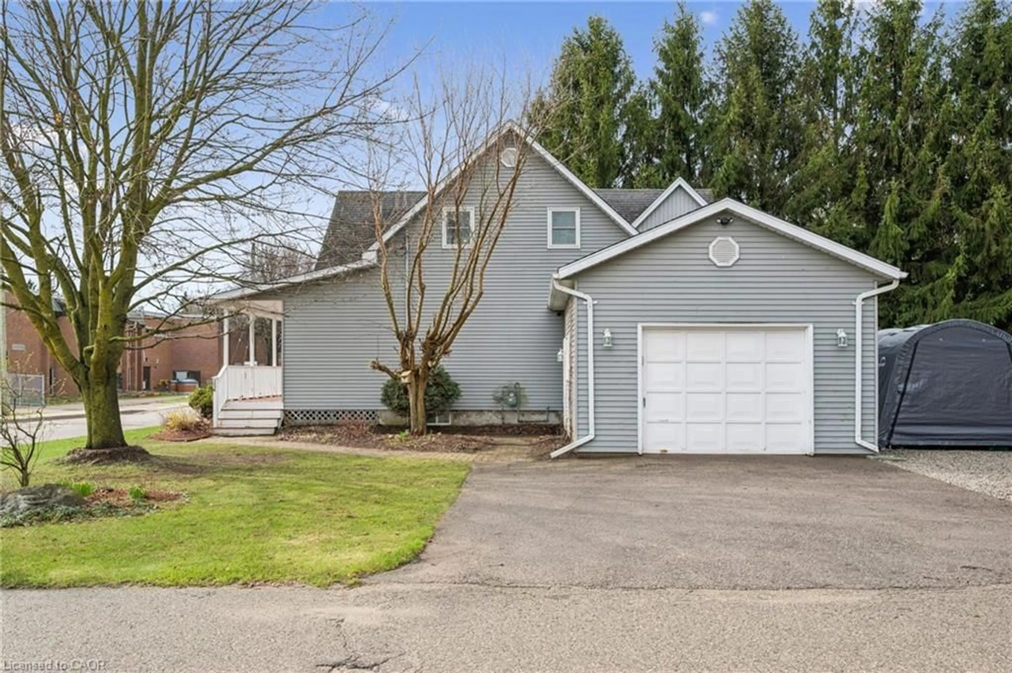 Home with vinyl exterior material, street for 22 Charles St, St. Clements Ontario N0B 2M0