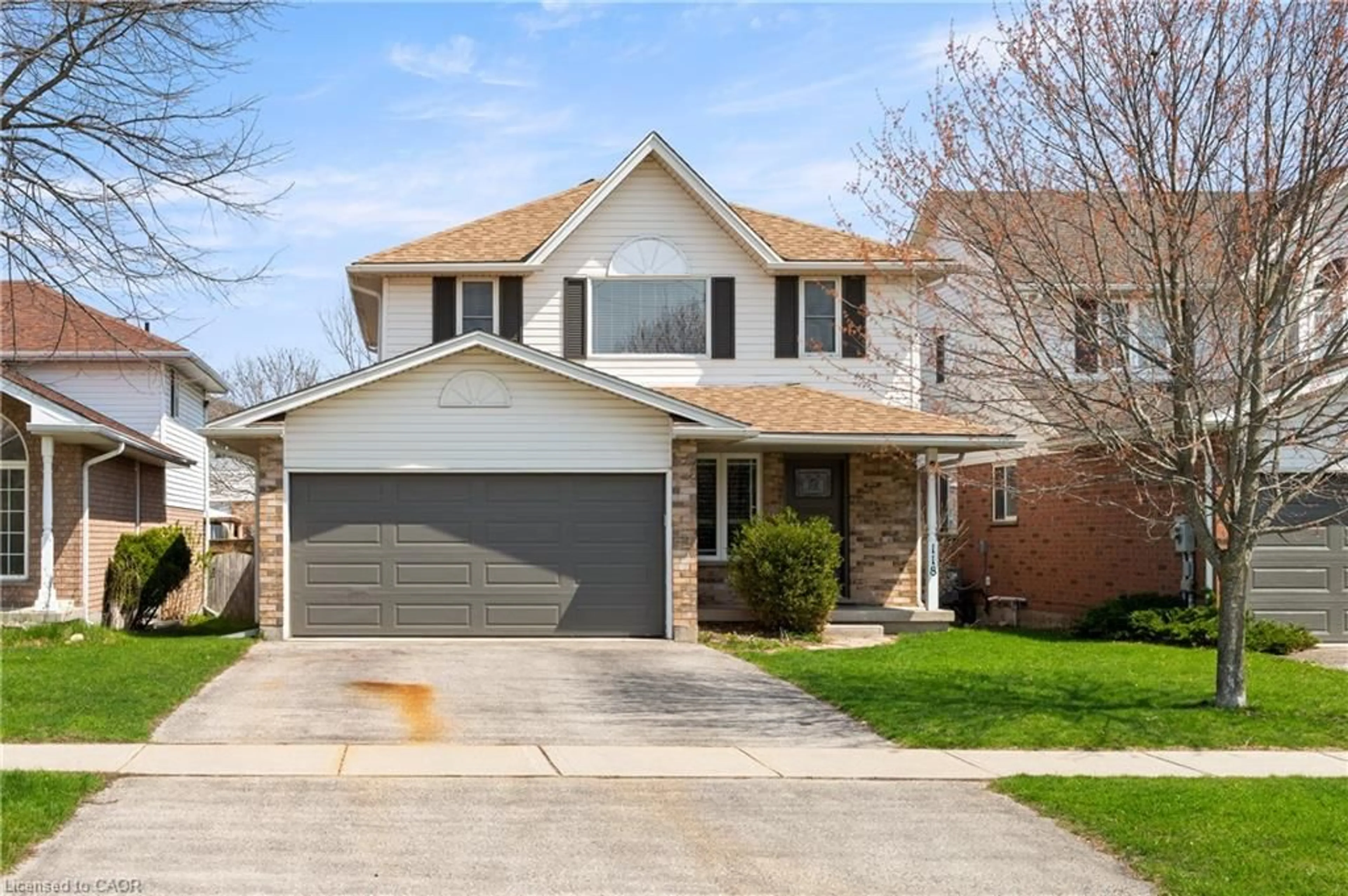 Home with brick exterior material, street for 118 Clairfields Dr, Guelph Ontario N1G 5A5
