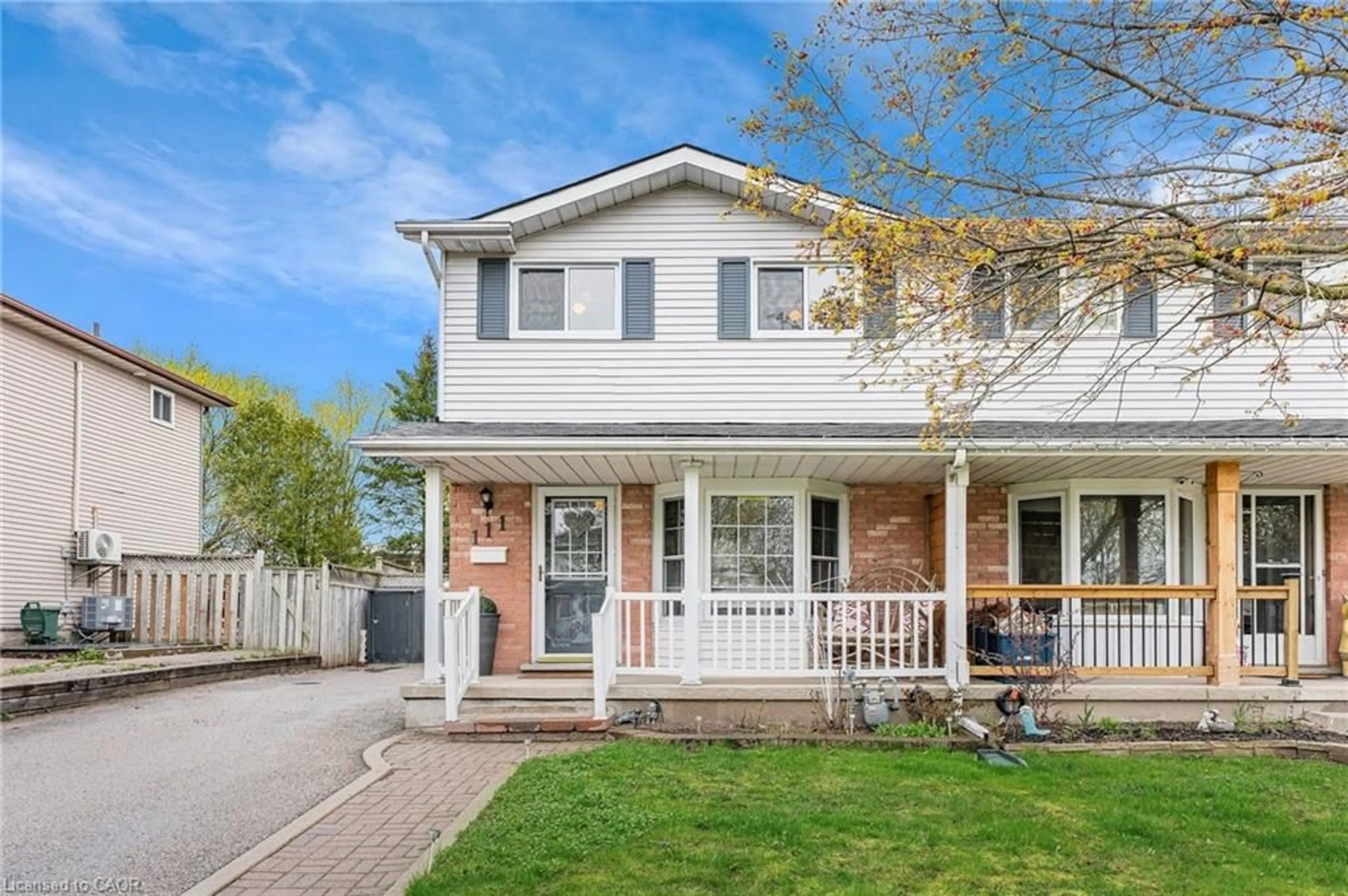 Home with vinyl exterior material, street for 111 Connelly Dr, Kitchener Ontario N2N 2T9