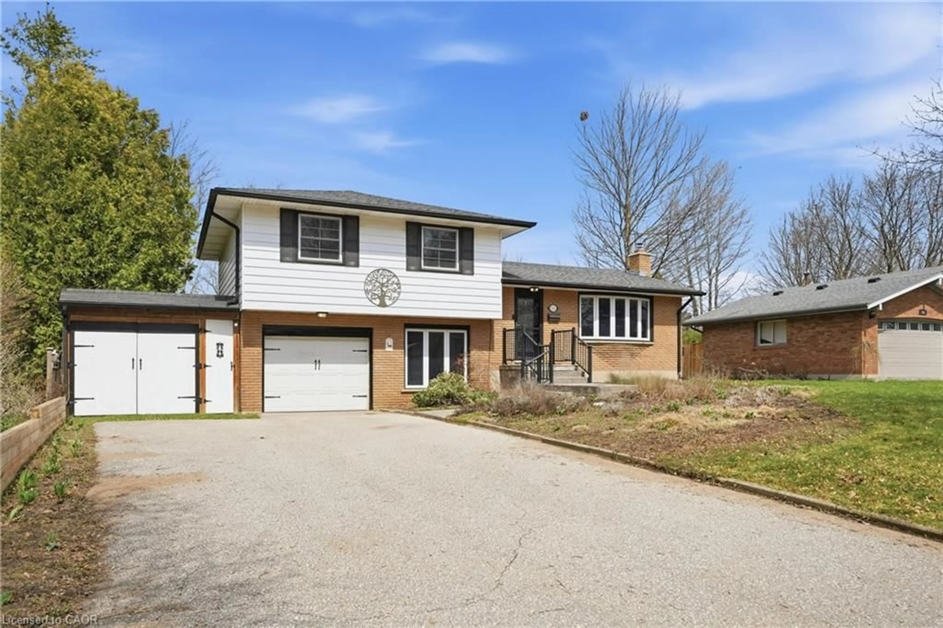 Home with brick exterior material, street for 55 Berkley Cres, Simcoe Ontario N3Y 4M7