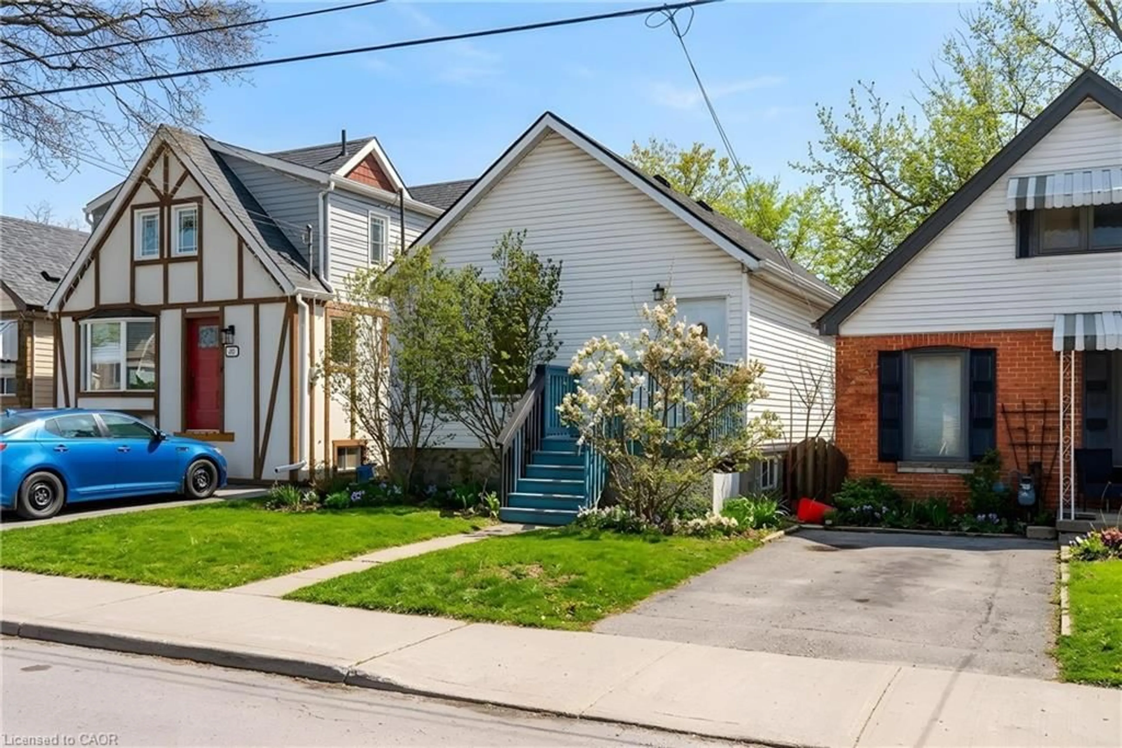 Home with brick exterior material, street for 218 East 8th St, Hamilton Ontario L9A 3L8