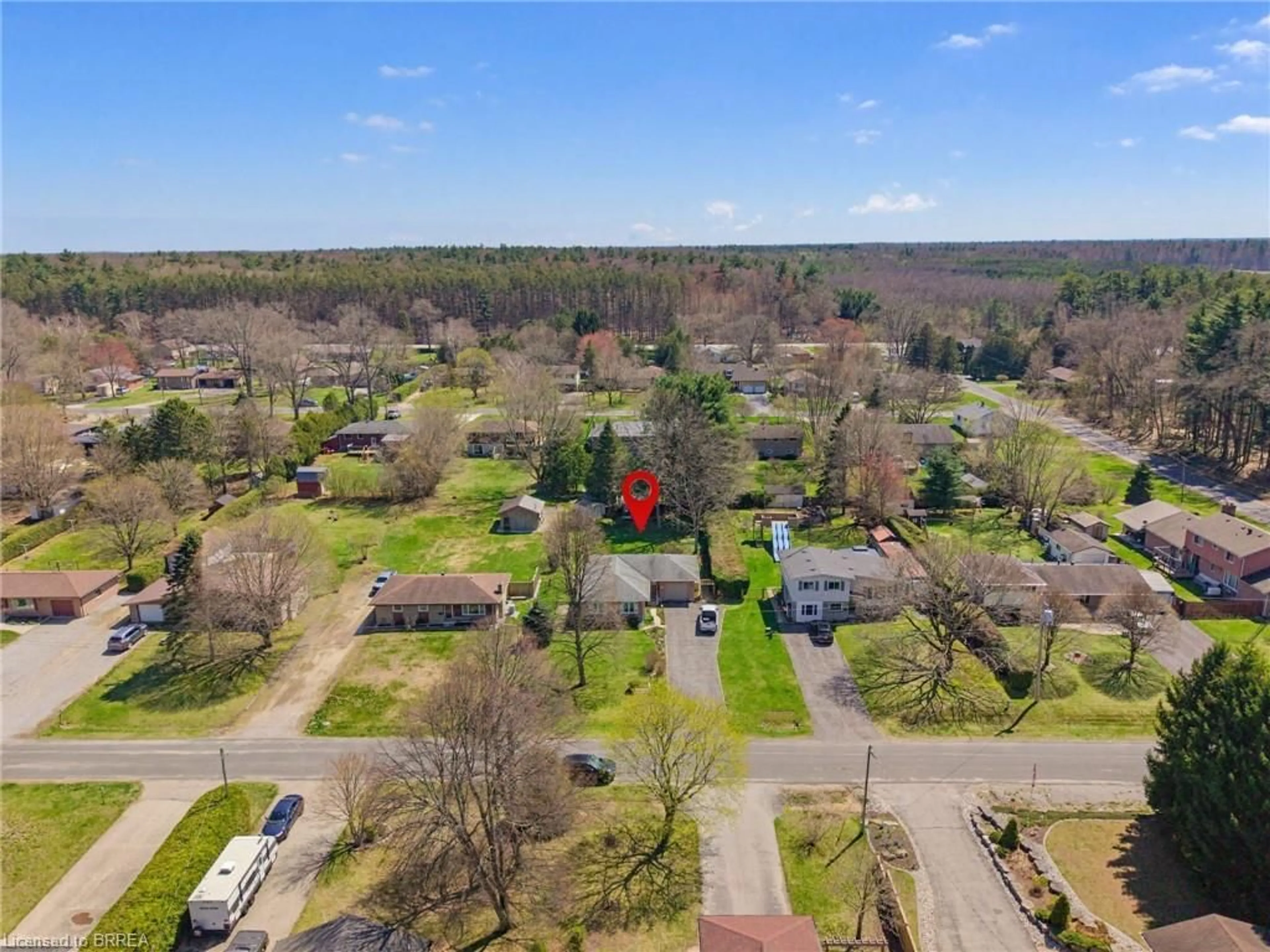 A pic from outside/outdoor area/front of a property/back of a property/a pic from drone, unknown for 65 Lyndhurst Ave, Pine Grove Ontario N3Y 4J9