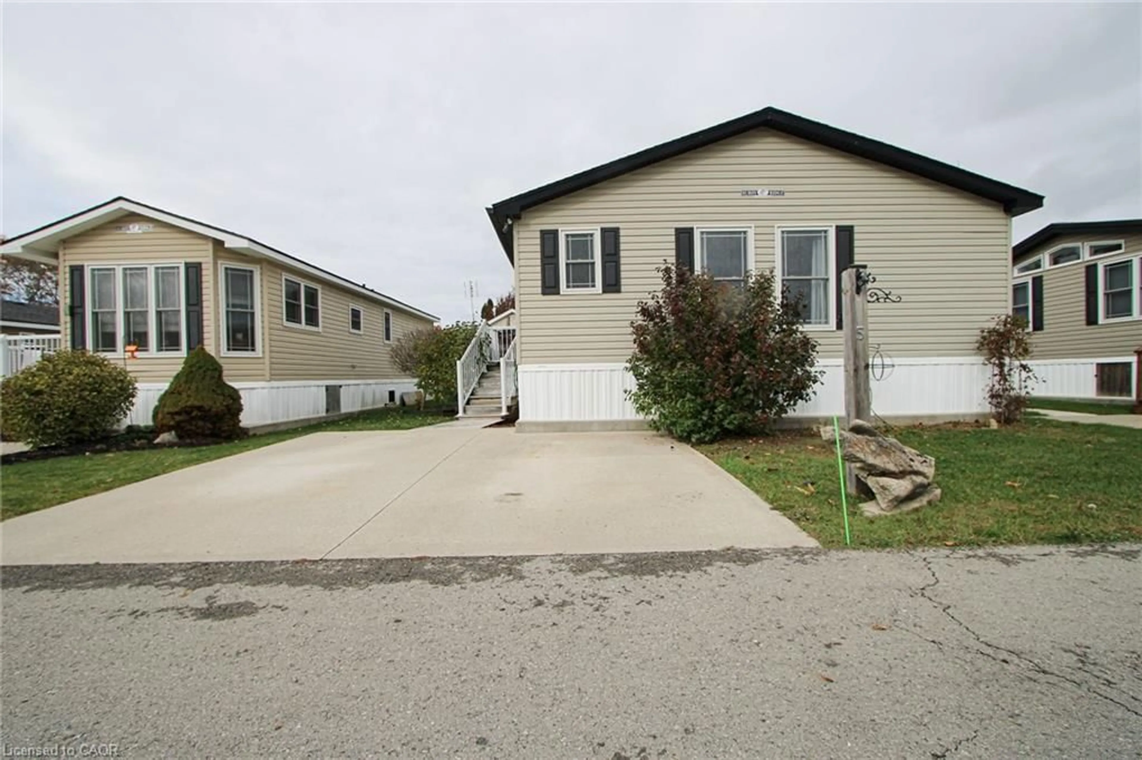 Home with vinyl exterior material, street for 4449 Milburough Line, Burlington Ontario L7P 0C5