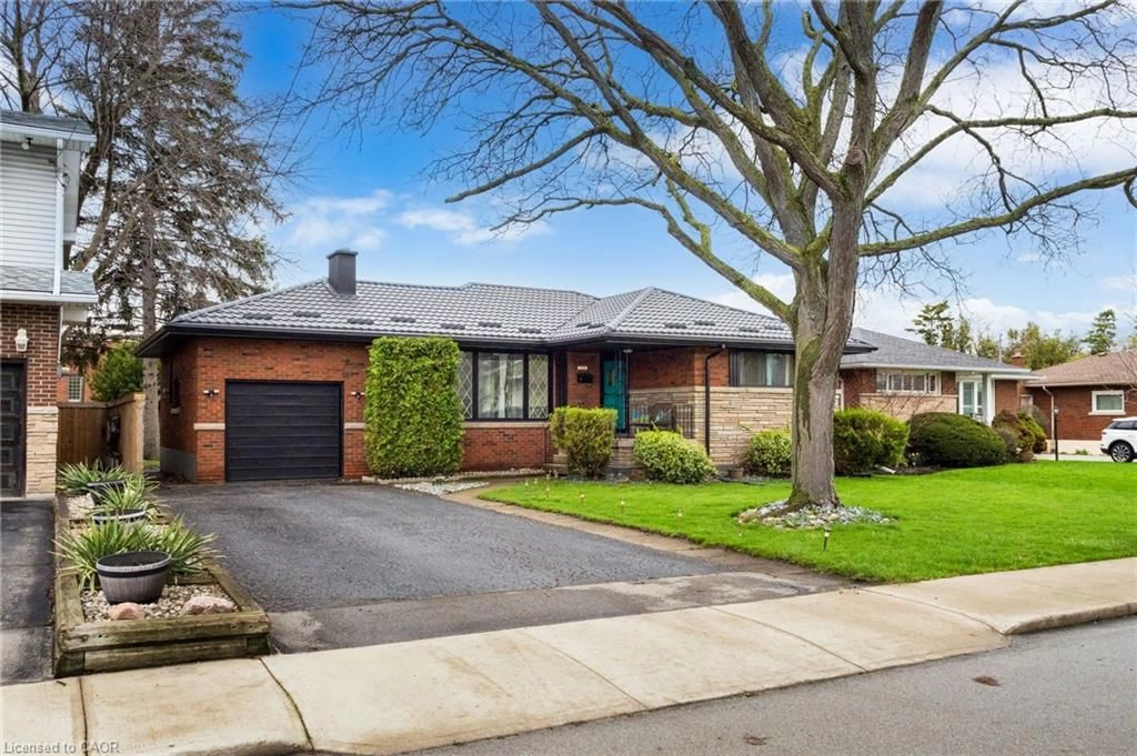 Home with brick exterior material, street for 32 Belair Dr, Hamilton Ontario L9A 2Z4