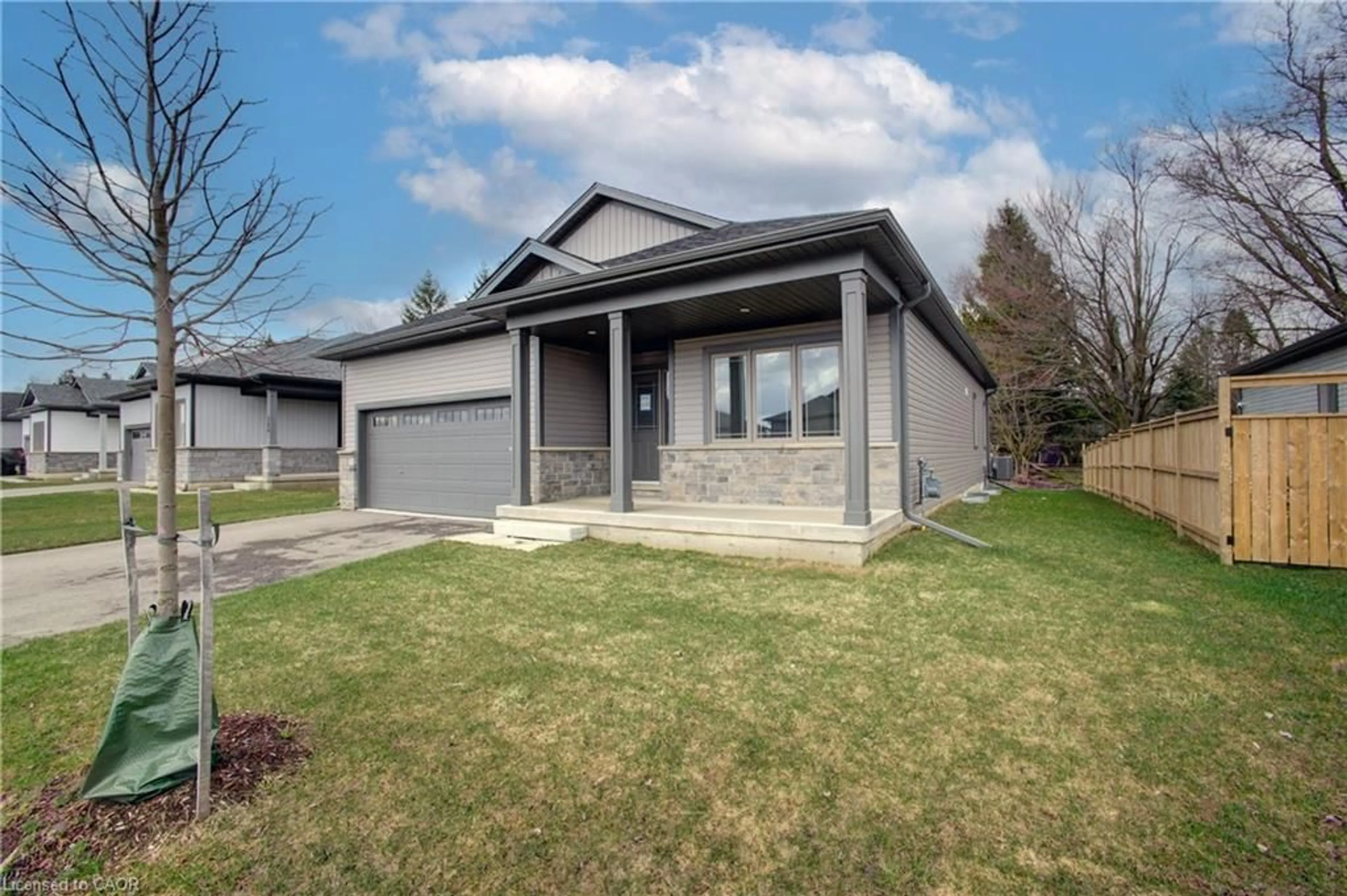 Home with vinyl exterior material, street for 160 Ellen St, Atwood Ontario N0G 1B0