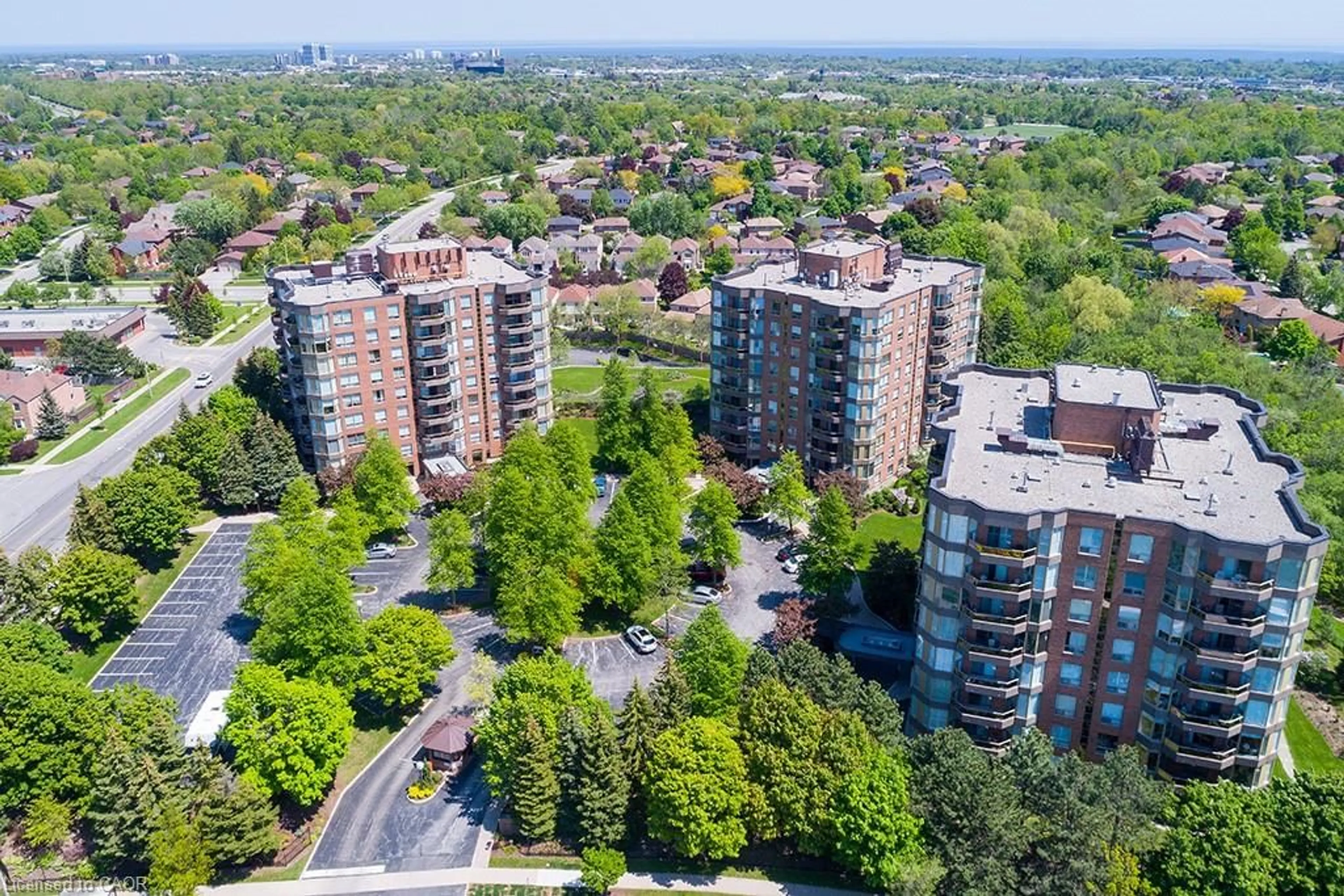 A pic from outside/outdoor area/front of a property/back of a property/a pic from drone, city buildings view from balcony for 1901 Pilgrims Way #706, Oakville Ontario L6M 2W9