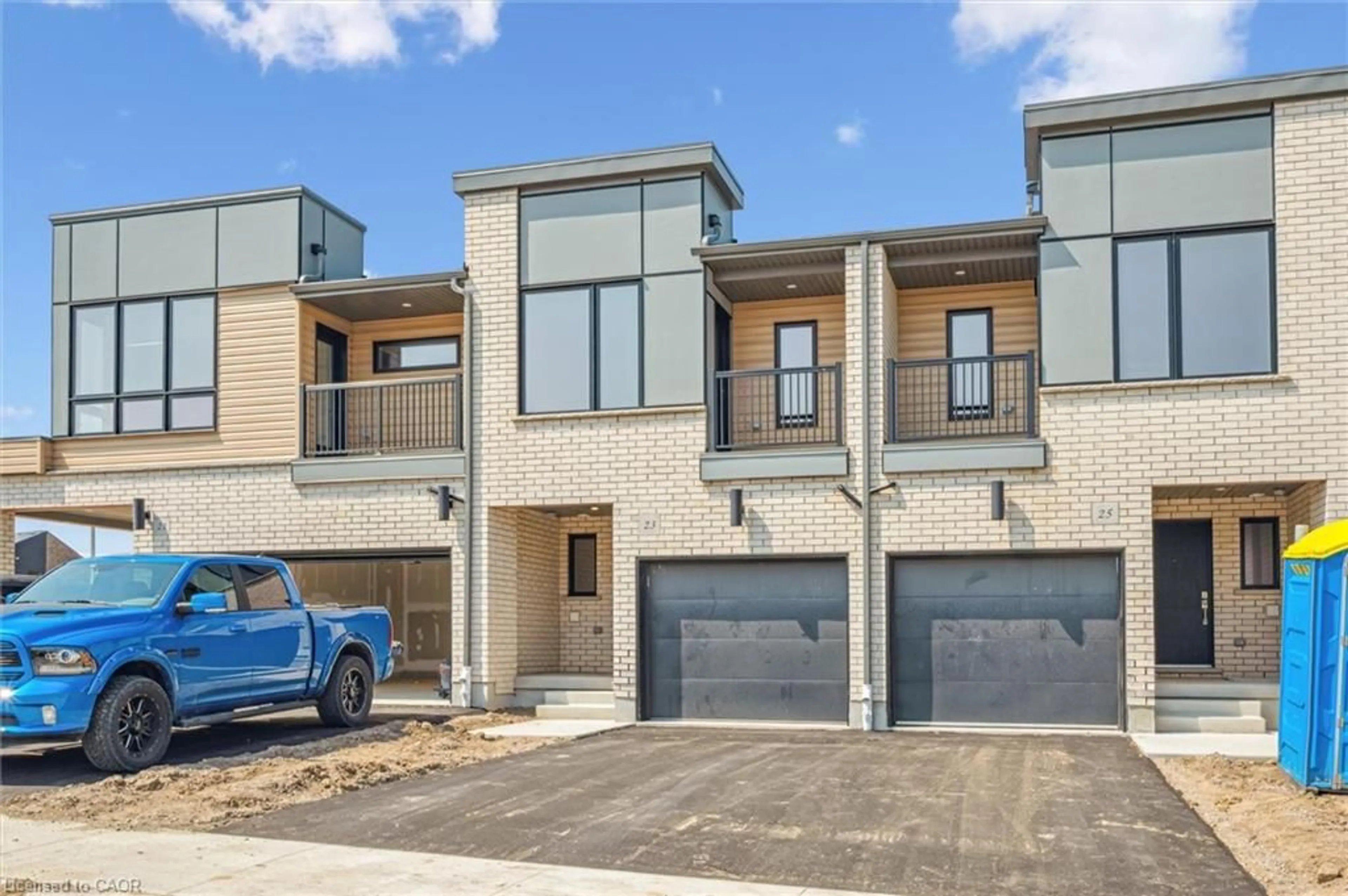 Home with brick exterior material, street for 23 Benninger Dr, Kitchener Ontario N2E 0K4