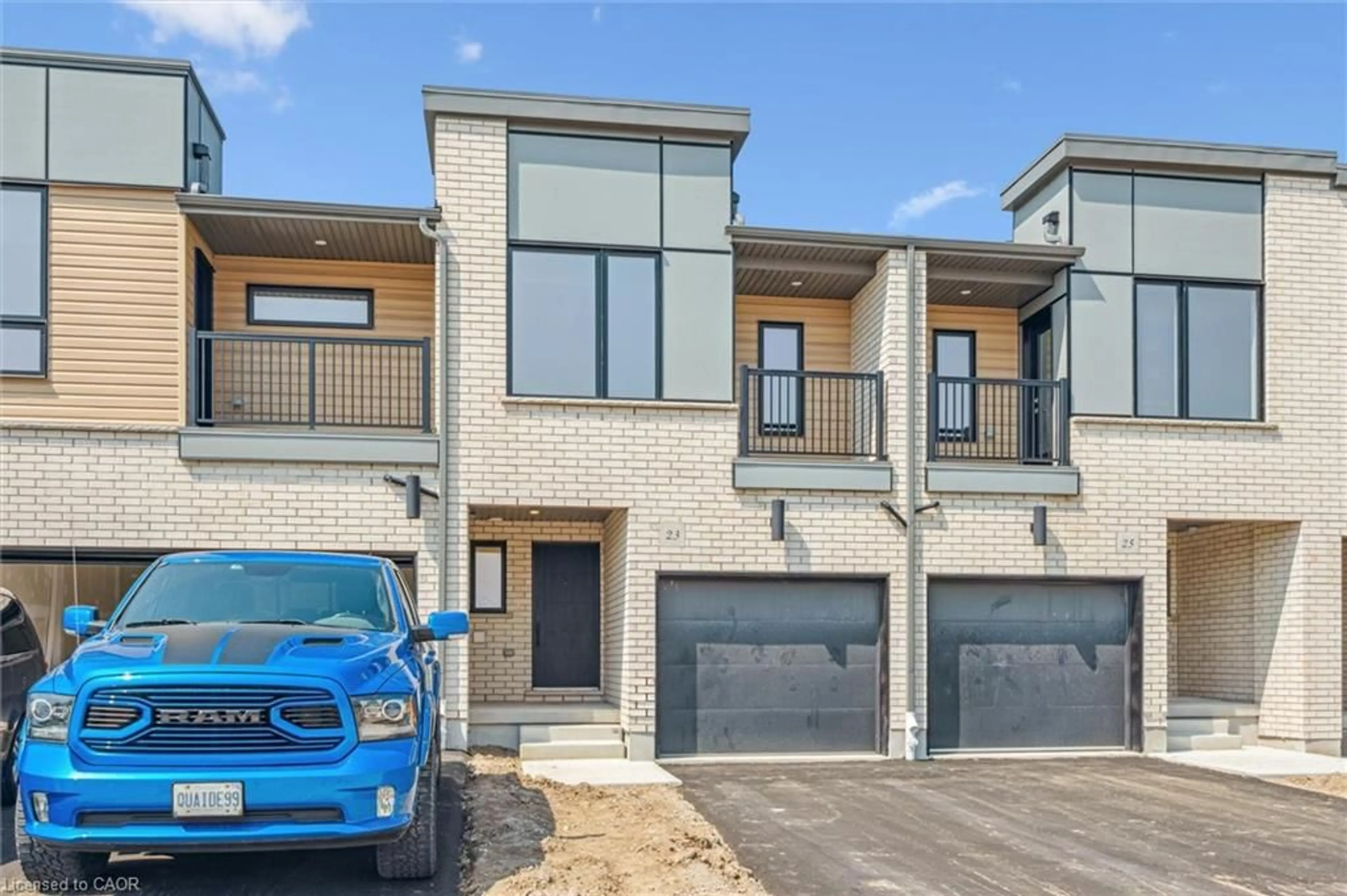 Home with brick exterior material, street for 23 Benninger Dr, Kitchener Ontario N2E 0K4