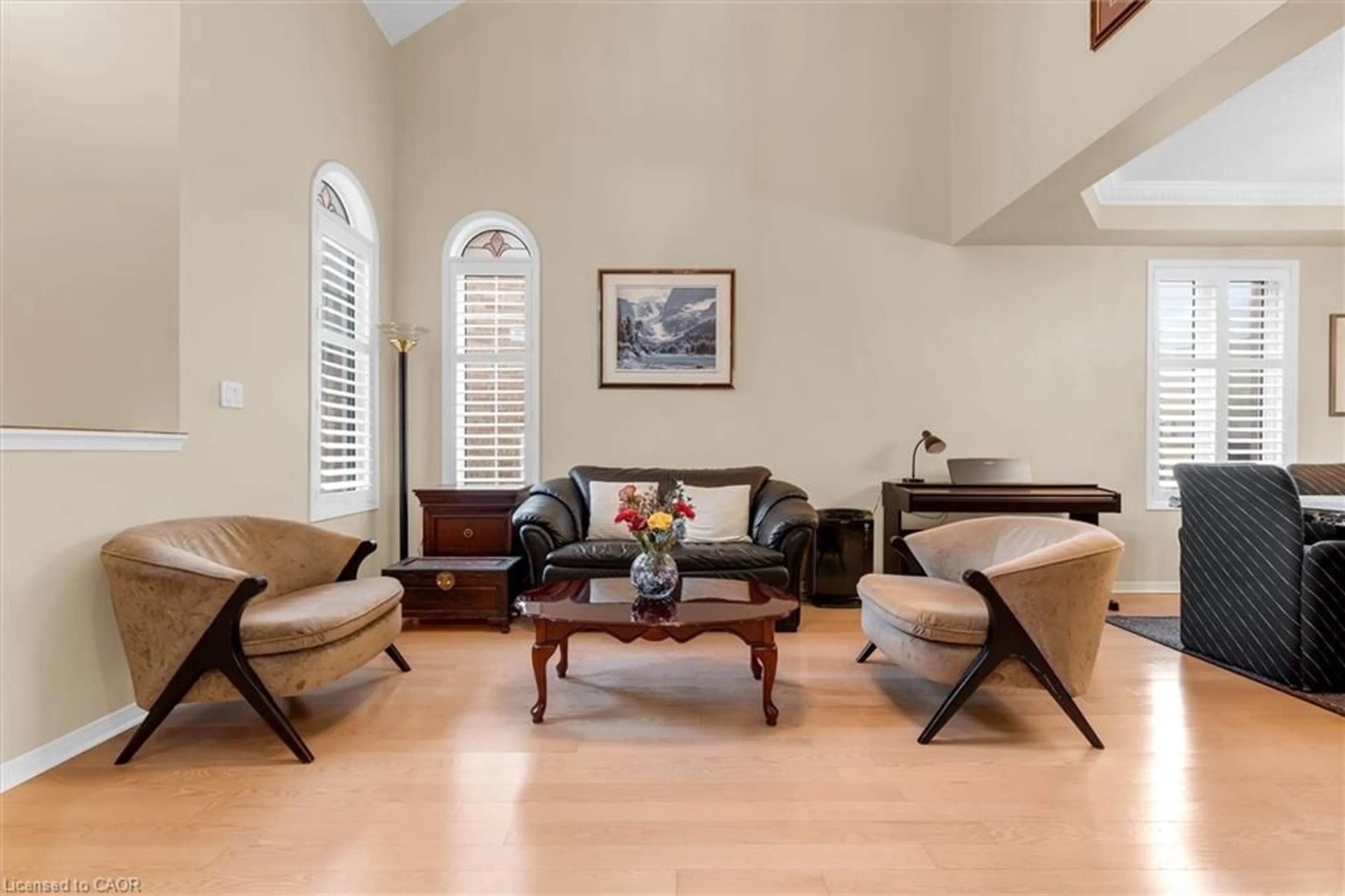 Living room with furniture, wood/laminate floor for 2141 Woodgate Dr, Oakville Ontario L6M 4E1