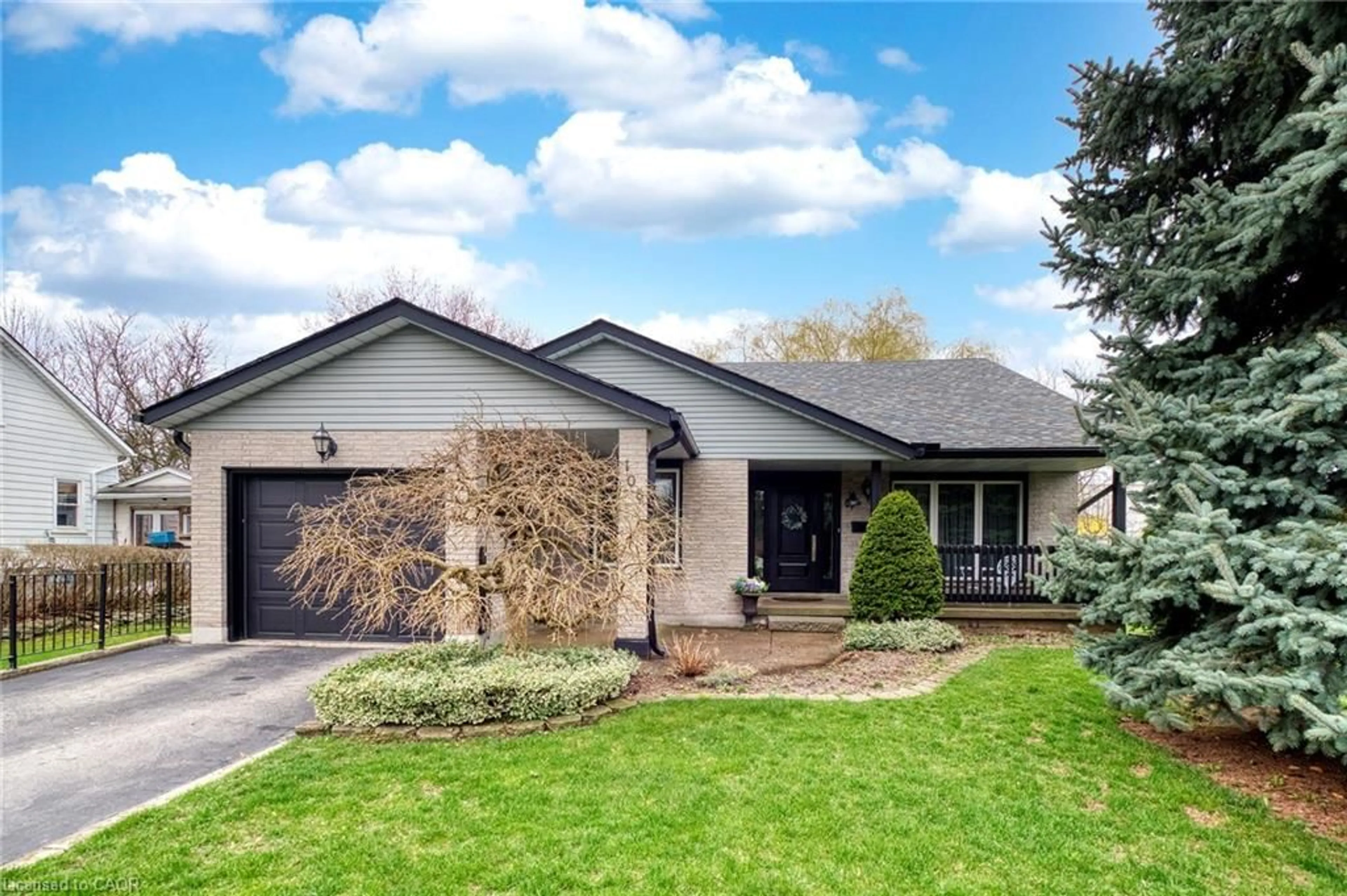 Home with brick exterior material, street for 108 Queensway Dr, St. Jacobs Ontario N0B 2N0