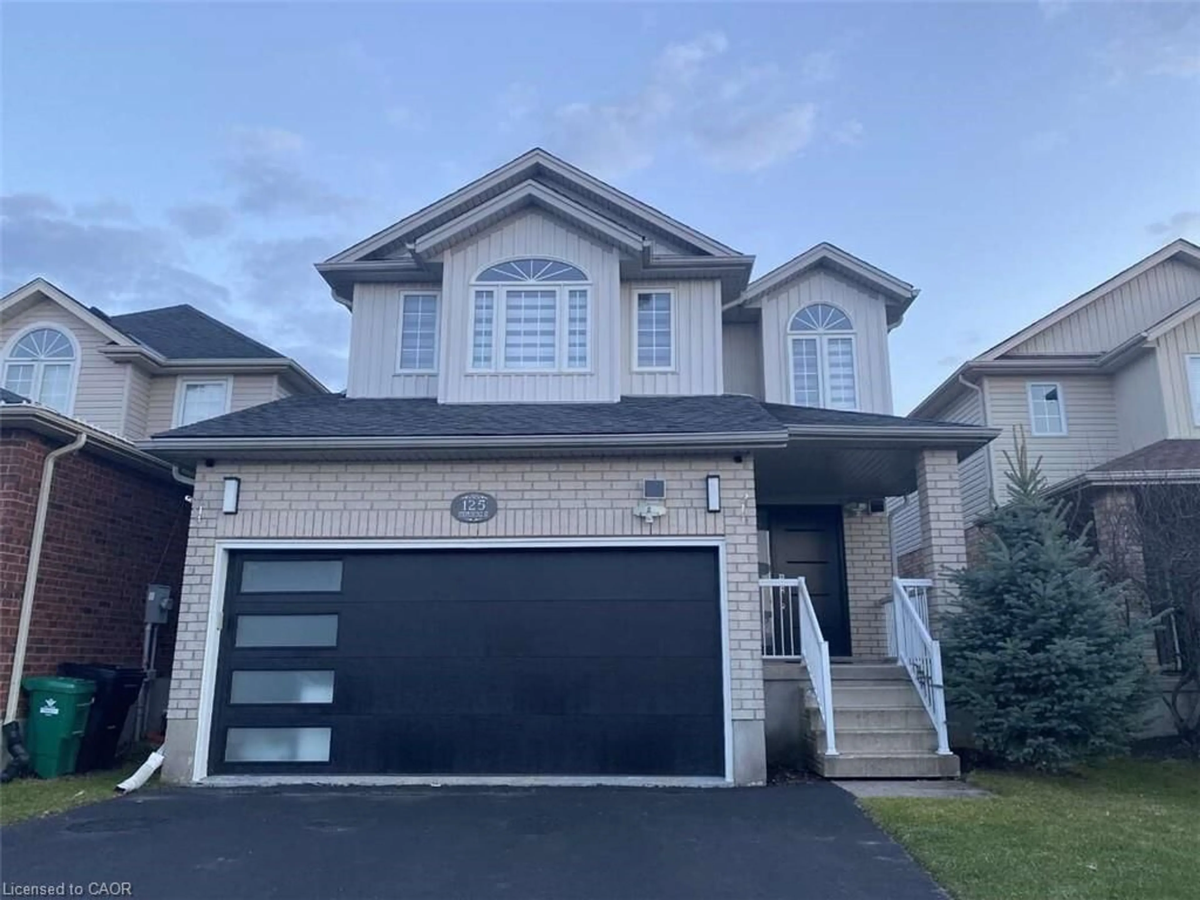 Home with vinyl exterior material, street for 125 Steepleridge St, Kitchener Ontario N2P 2W2