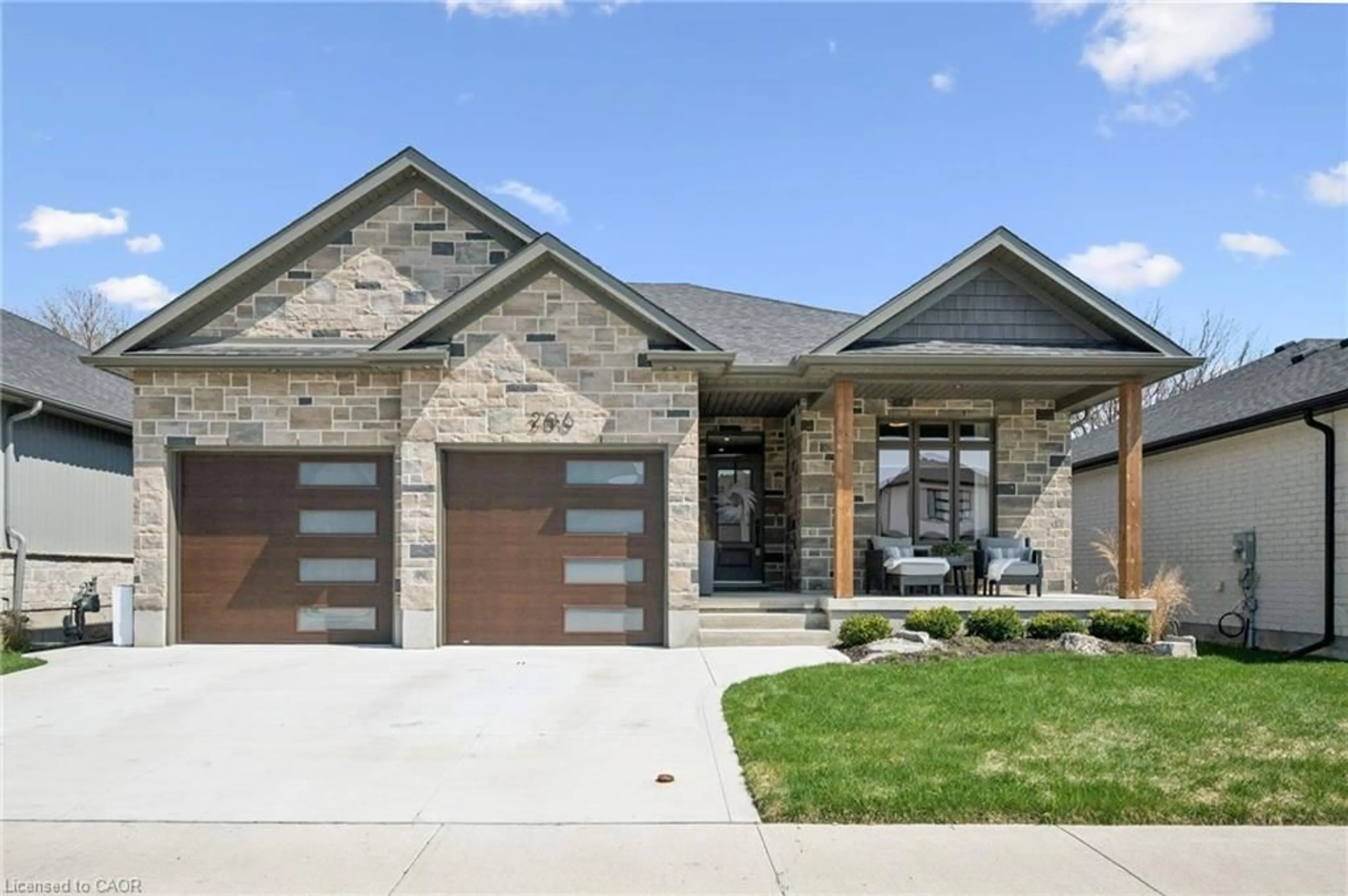 Home with brick exterior material, street for 206 Timber Trail Rd, Elmira Ontario N3B 0E4