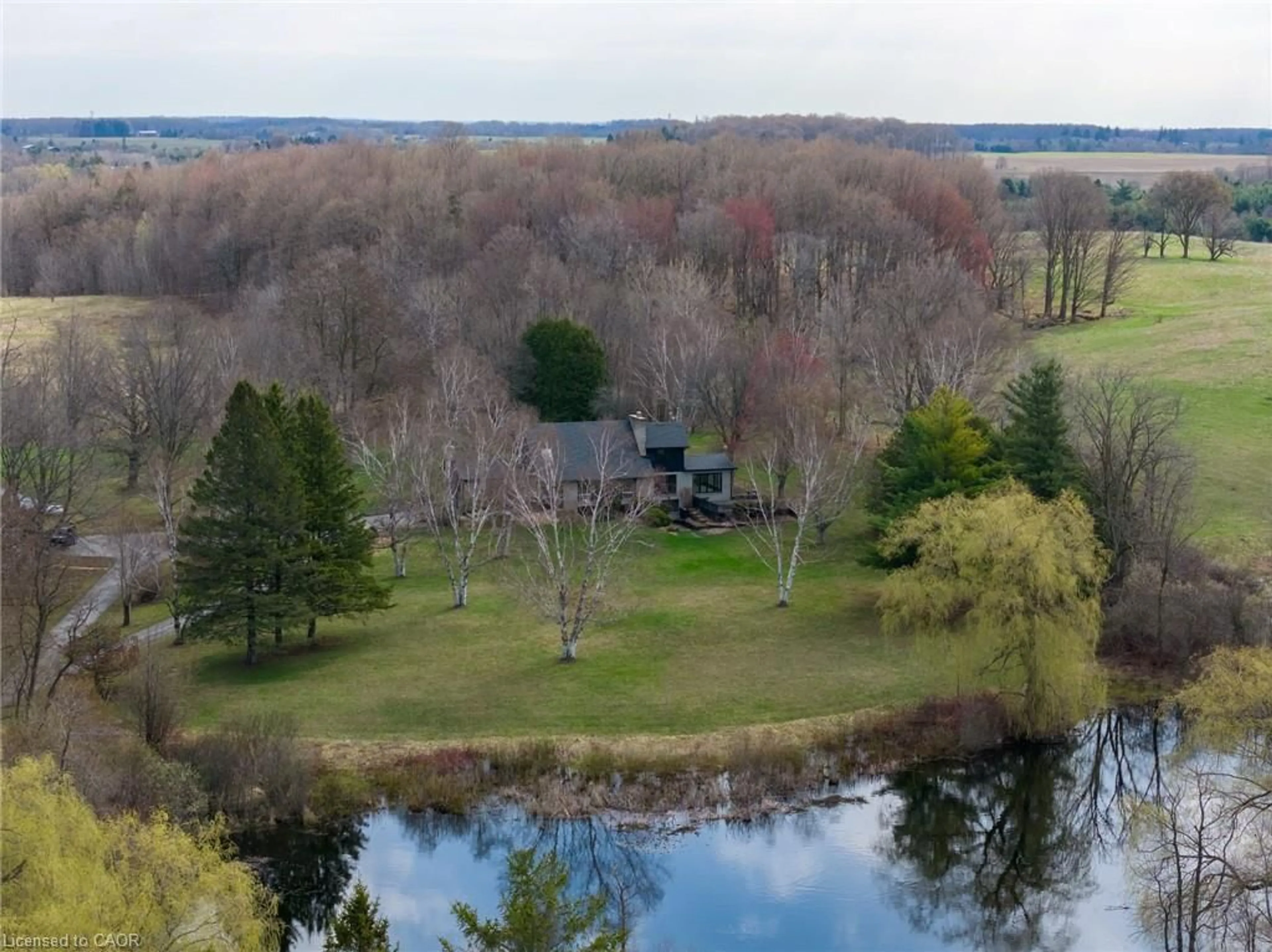 A pic from outside/outdoor area/front of a property/back of a property/a pic from drone, water/lake/river/ocean view for 15633 Kennedy Rd, Caledon Ontario L7C 2H7