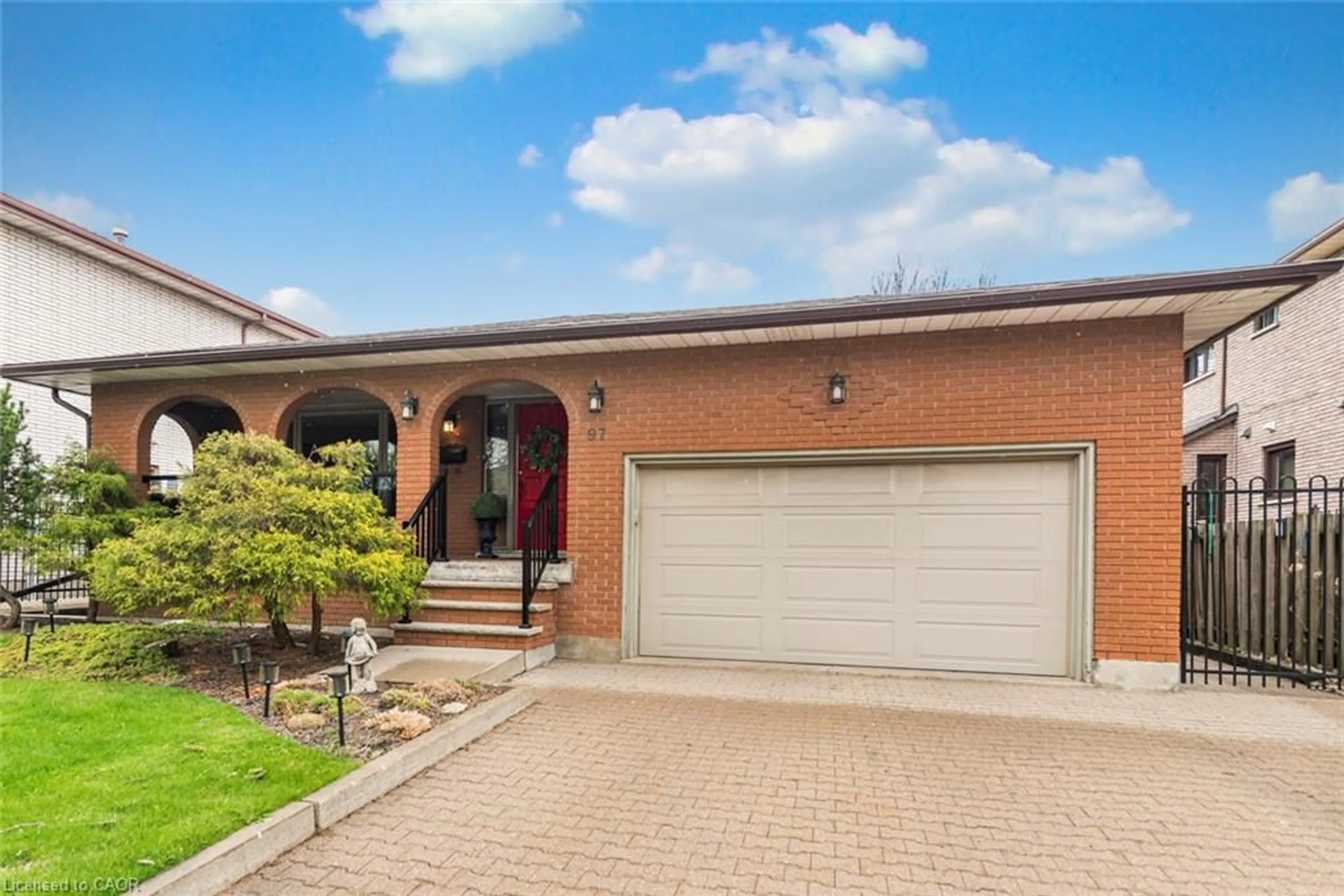 Home with brick exterior material, street for 97 Albion Falls Blvd, Hamilton Ontario L8W 1R4